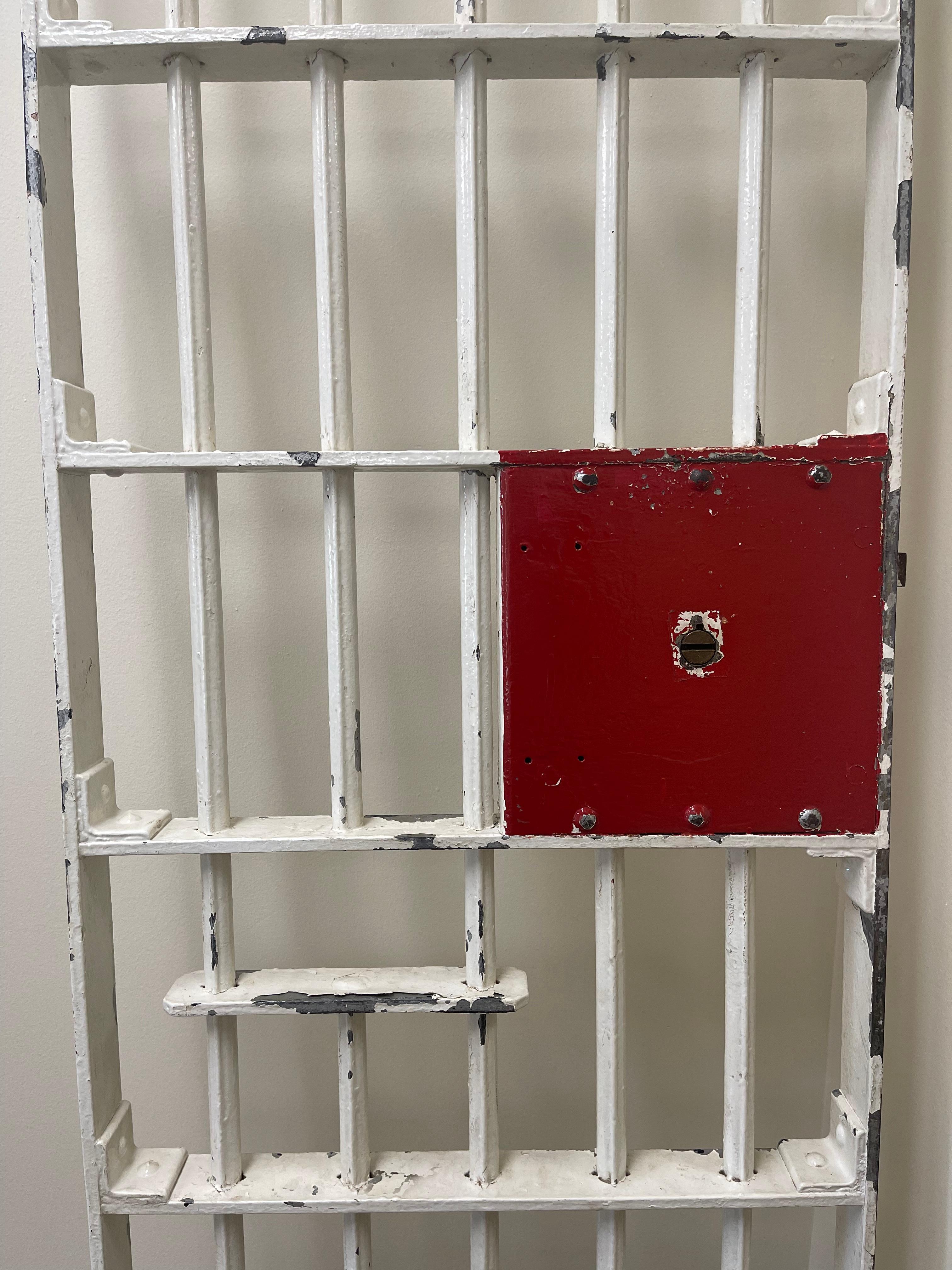 An authentic relic from an Ohio jail makes an imaginative architectural element. Original chippy paint with bright red area around the lock. On casters.
Very heavy!