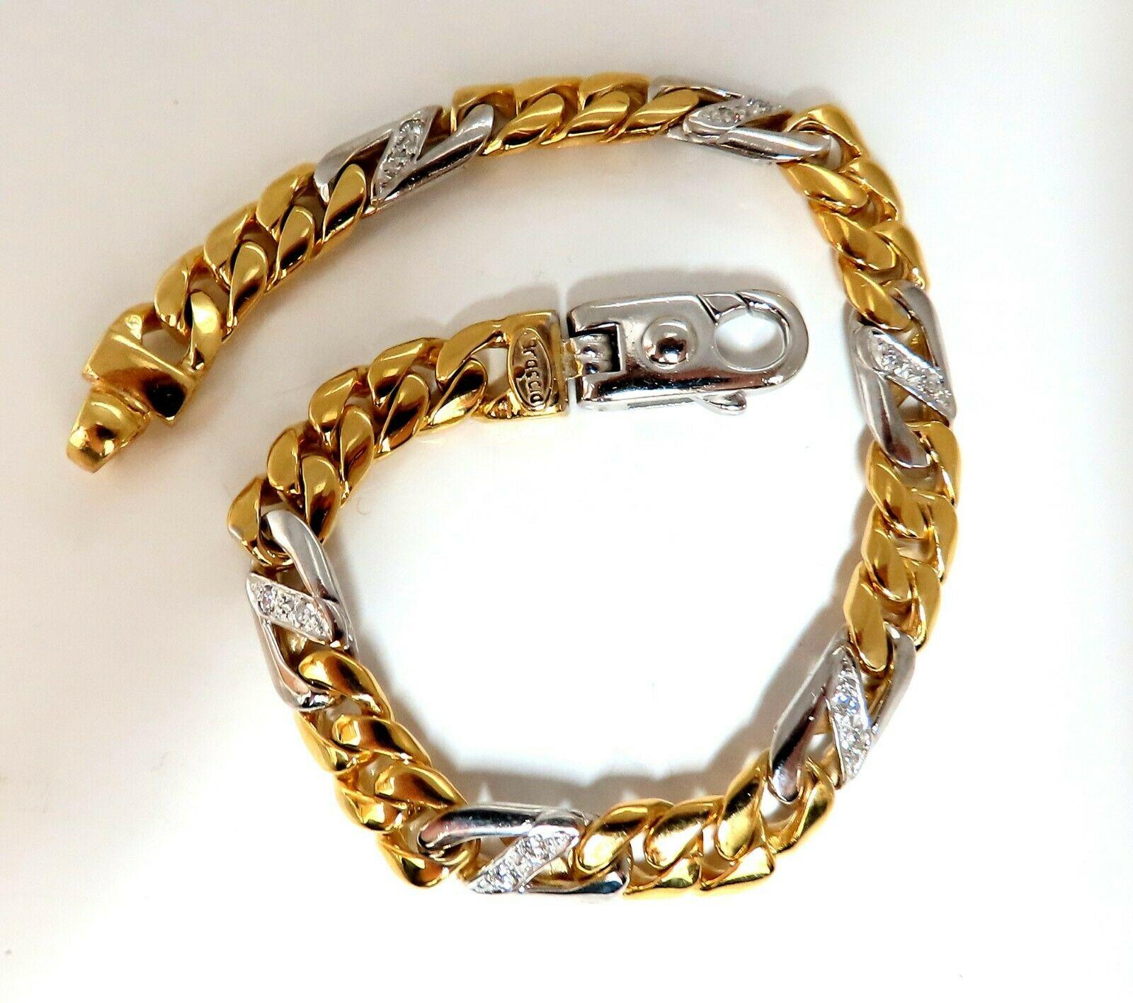 Authentic Italian Braccio Diamonds Curb Link Bracelet

Excellent Well made & Durable

.50ct. natural diamonds:

Rounds & Full Cuts

Vs-2 clarity, H colors

Very well made

40.1 grams.

14kt. Yellow & white gold. 

Measures 8.75 inches long.

7.3mm