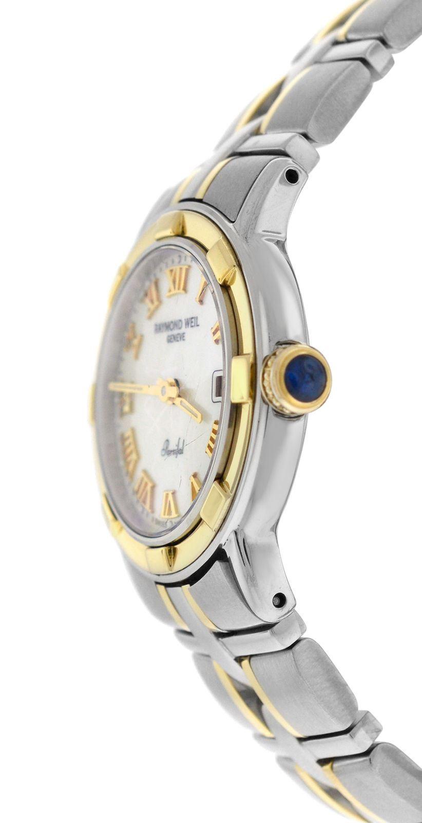 Brand	Raymond Weil
Model	Parsifal 9440
Gender	Ladies
Condition	Pre-owned
Movement	Swiss Quartz
Case Material	Stainless Steel  & 18K Yellow Gold
Bracelet / Strap Material	
Stainless Steel & 18K Yellow Gold

Clasp / Buckle Material	
Stainless Steel