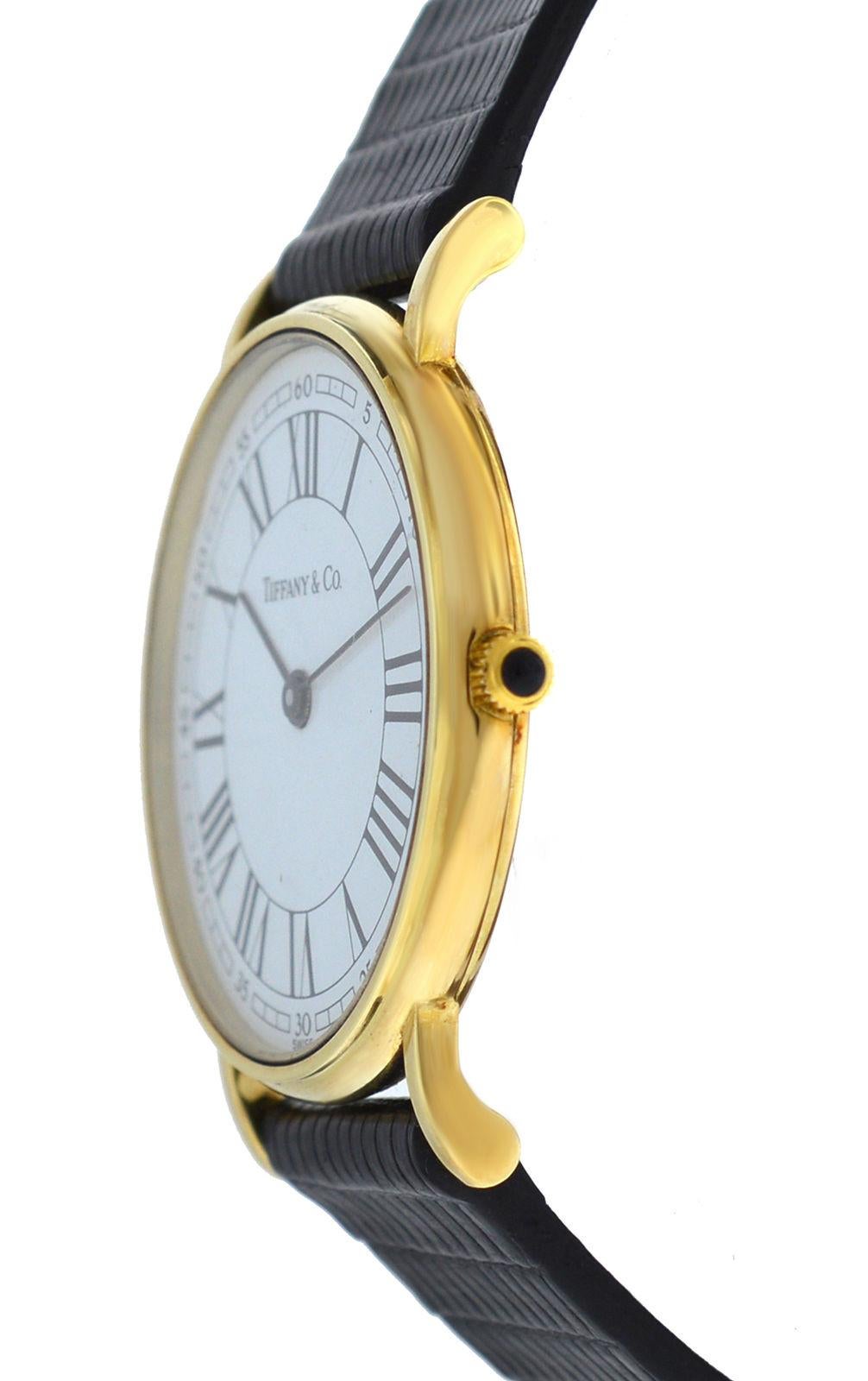 Brand	Tiffany & Co.
Model	Classic
Gender	Ladies
Condition	Pre - Owned
Movement	Swiss Quartz
Case Material	14K Yellow Gold
Bracelet / Strap Material	Genuine Lizard
Clasp / Buckle Material	Gold plated steel
Clasp Type	Tang
Bracelet / Strap width	16 mm