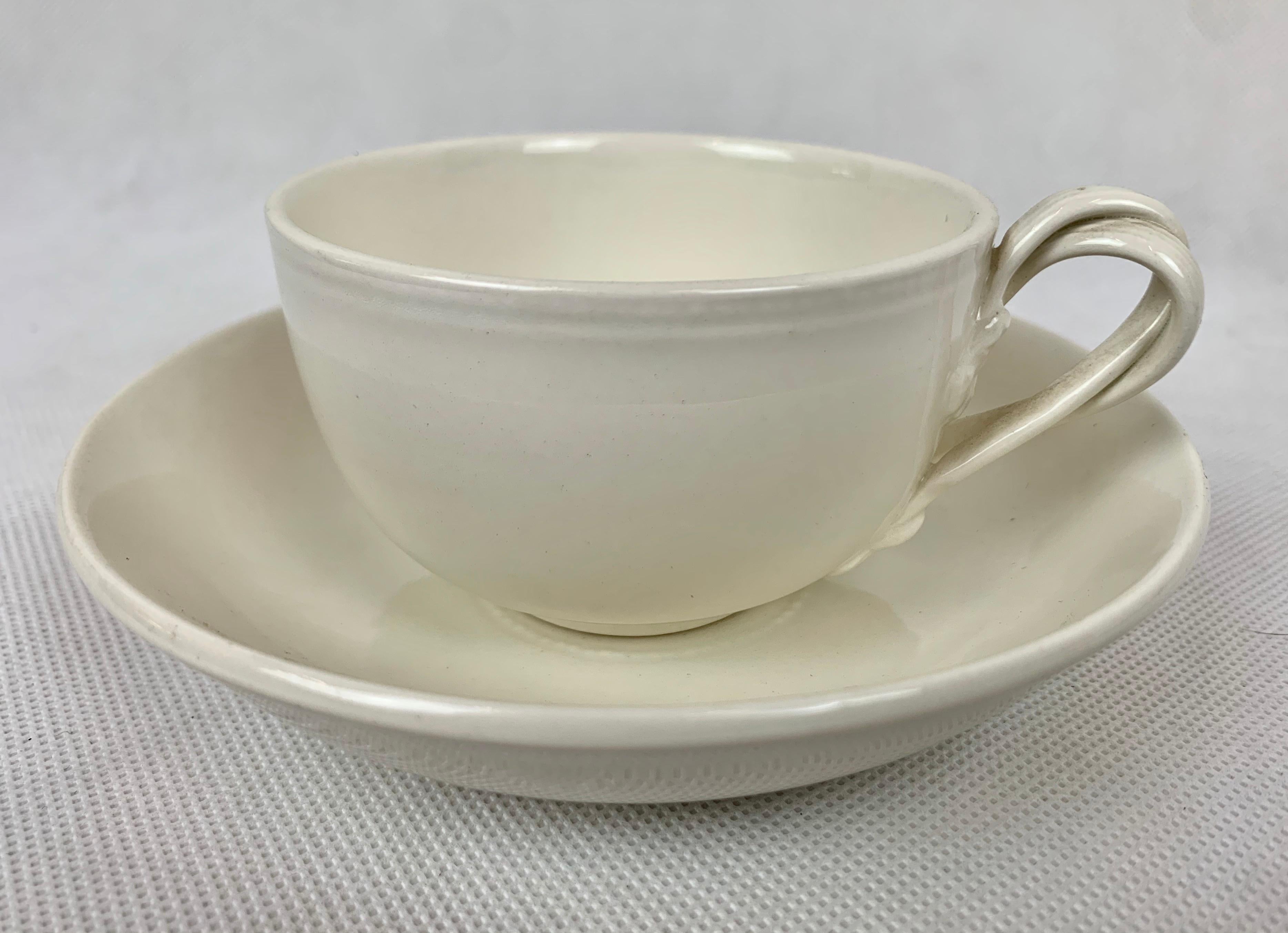 Set of six cups and saucers made by the Authentic Leedsware Company, England. They have the double strap applied handles and a deep saucer for cooling and drinking tea. I purchased these along with other cream ware pieces directly from the company