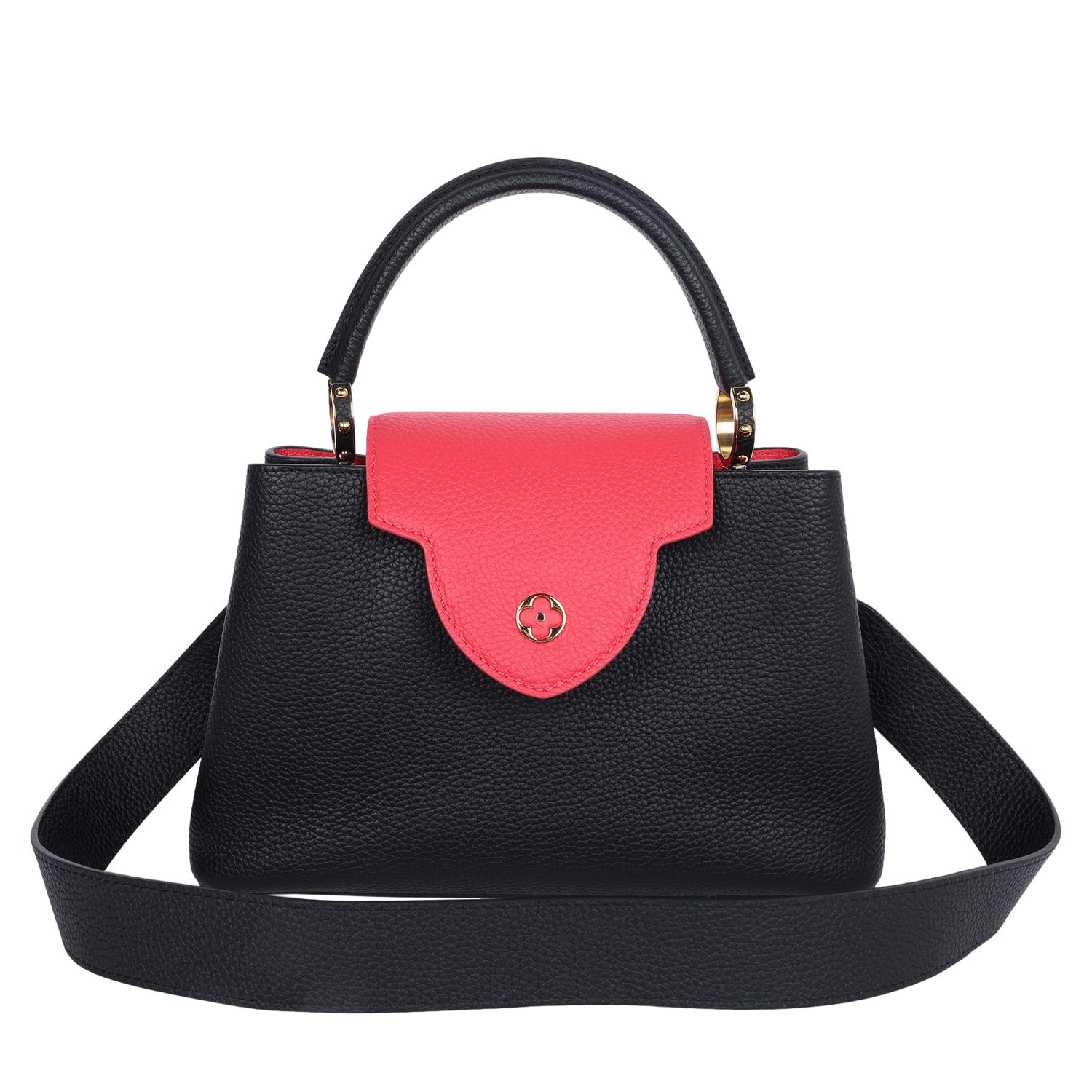 Authentic, pre-loved Louis Vuitton Special Edition Capucines MM handbag in black and Rose Berlingot.  Features full-grain Taurillon leather skin, the bag’s two-way flap and leather-wrapped LV signature are in a beautiful fashionable contrasting hue.