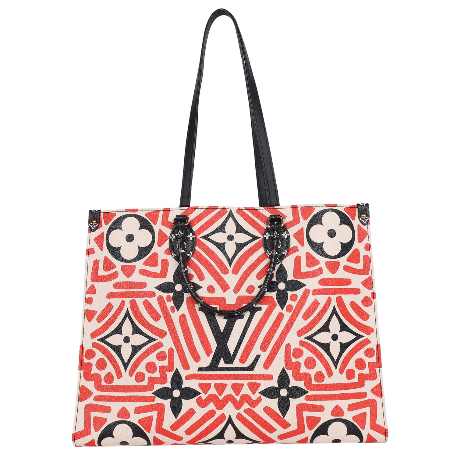 Authentic Louis Vuitton OnTheGo Tote Limited Edition Crafty Monogram Giant GM in red and black. Features monogram giant coated canvas, brass hardware, dual flat shoulder straps, dual rolled top handles, canvas lining, three interior pockets one with