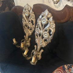 Authentiques appliques murales Louis XVI en bois de tilleul argenté, en sicilienne et en fer