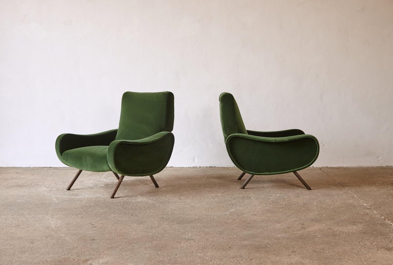 A pair of original and authentic early Marco Zanuso lady chairs, Arflex, Italy, 1950s. Newly reupholstered in an elegant dark green velvet. Brass feet with original natural patina. Firm seat.




UK customers please note: displayed prices do