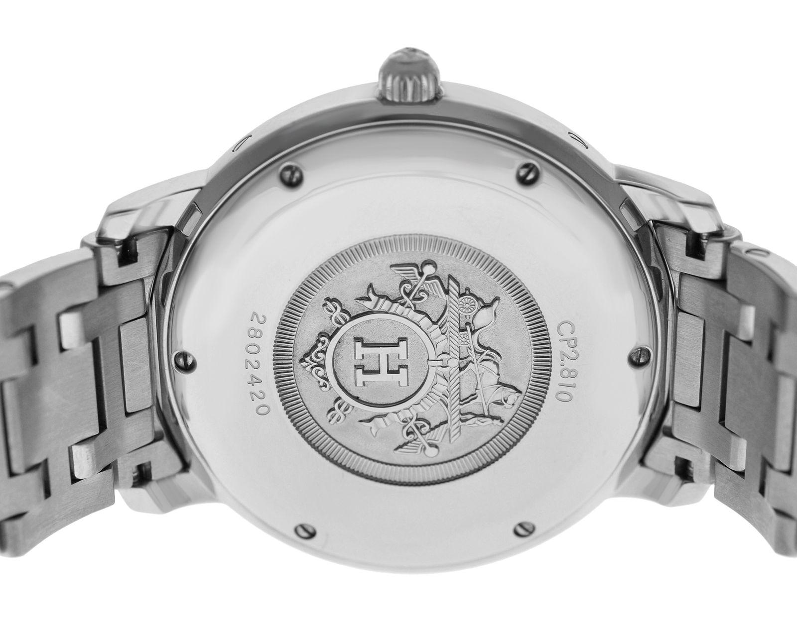 Brand	Hermes
Model	Clipper CP2.810
Gender	Men's 
Condition	Pre-owned
Movement	Swiss Automatic
Case Material	Stainless Steel
Bracelet / Strap Material	
Stainless Steel

Clasp / Buckle Material	
Stainless Steel 

Clasp Type	Butterfly
