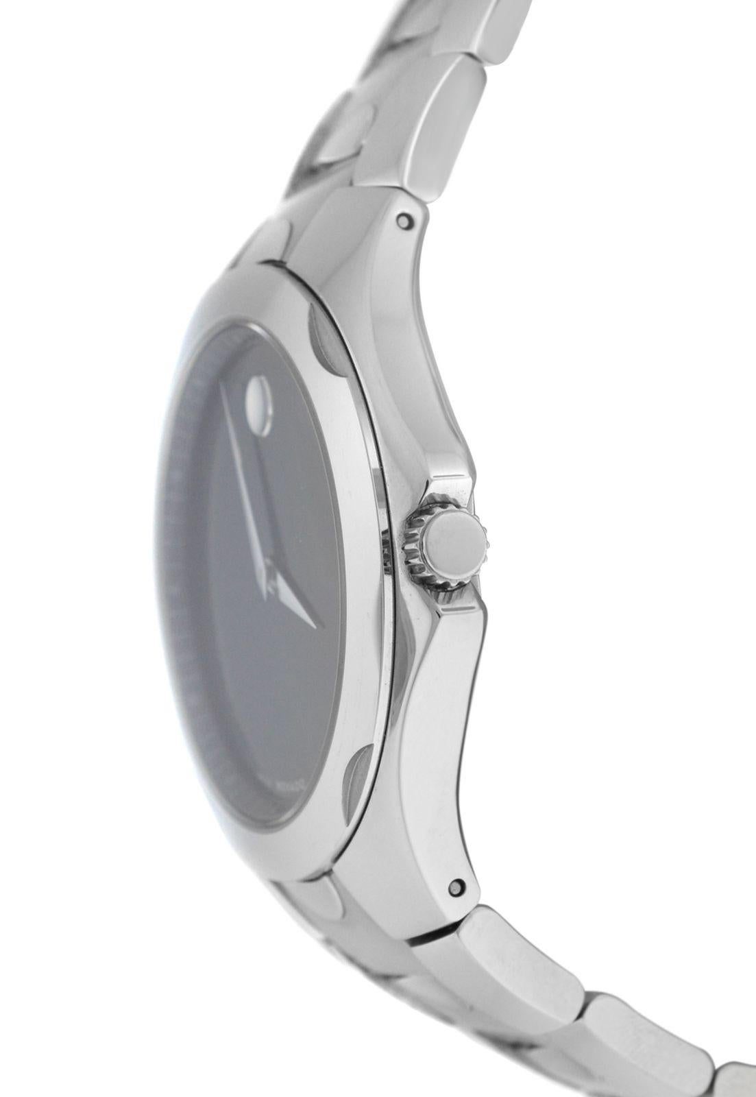 Marca	Movado
Modelo	Luno 84 G1 1853
Género	Mens 
Condición	Seminuevo
Movimiento	Cuarzo suizo
Material del maletín	Acero inoxidable
Material de la pulsera	
Acero inoxidable

Material del cierre/hebilla	
Acero inoxidable	
Tipo de cierre	Despliegue de