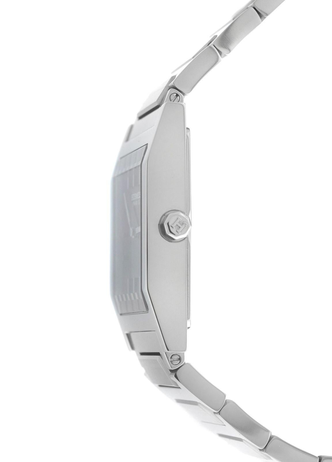 Brand	Hermes
Model	Tandem TA1.710
Gender	Men's Unisex
Condition	Pre-owned
Movement	Swiss Quartz
Case Material	Stainless Steel
Bracelet / Strap Material	
Stainless Steel

Clasp / Buckle Material	
Stainless Steel 

Clasp Type	Butterfly