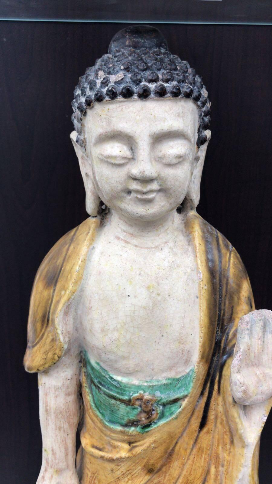 A Ming dynasty (1368-1644) standing Guan Yin Buddha. Yin is a shortened form of Guanshiyin which translates as 'observing the sounds of the world' Guan Yin was venerated by East Asian Buddhist. This figure has been fully authenticated by a