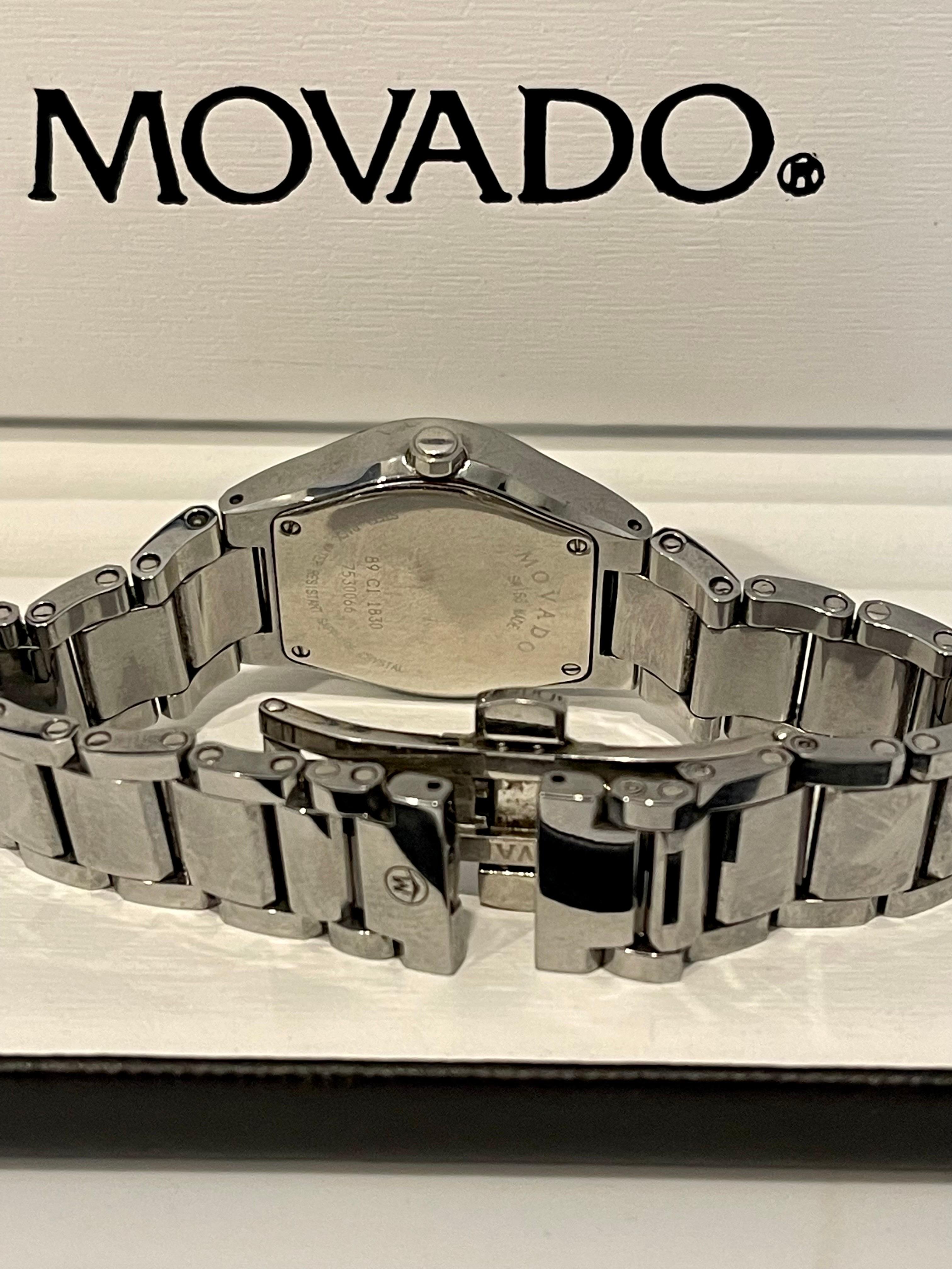  Authentique montre à quartz Movado pour femmes avec cadran noir Stiri, bracelet en acier inoxydable Pour femmes 