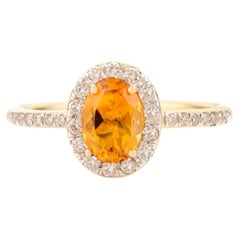 Authentique bague pour femmes en or jaune 14 carats avec citrine jaune taille ovale et halo de diamants