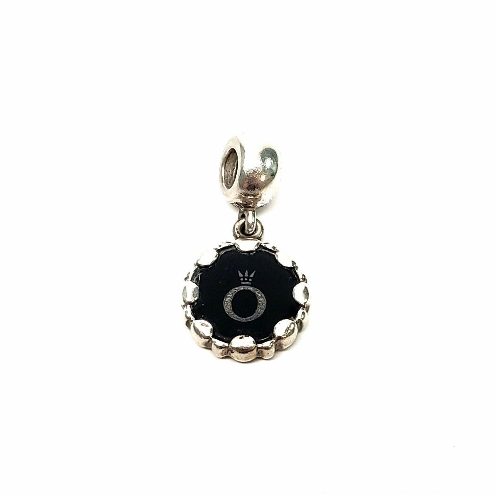 One authentic Pandora sterling silver Butterfly Cameo charm dangle featuring a blue cameo butterfly on one side, and a Pandora crown O on the other side.

Retired

#790865CAM

Marked S925 ALE.

Weighs approx 2.5dwt.

Very good pre-owned condition