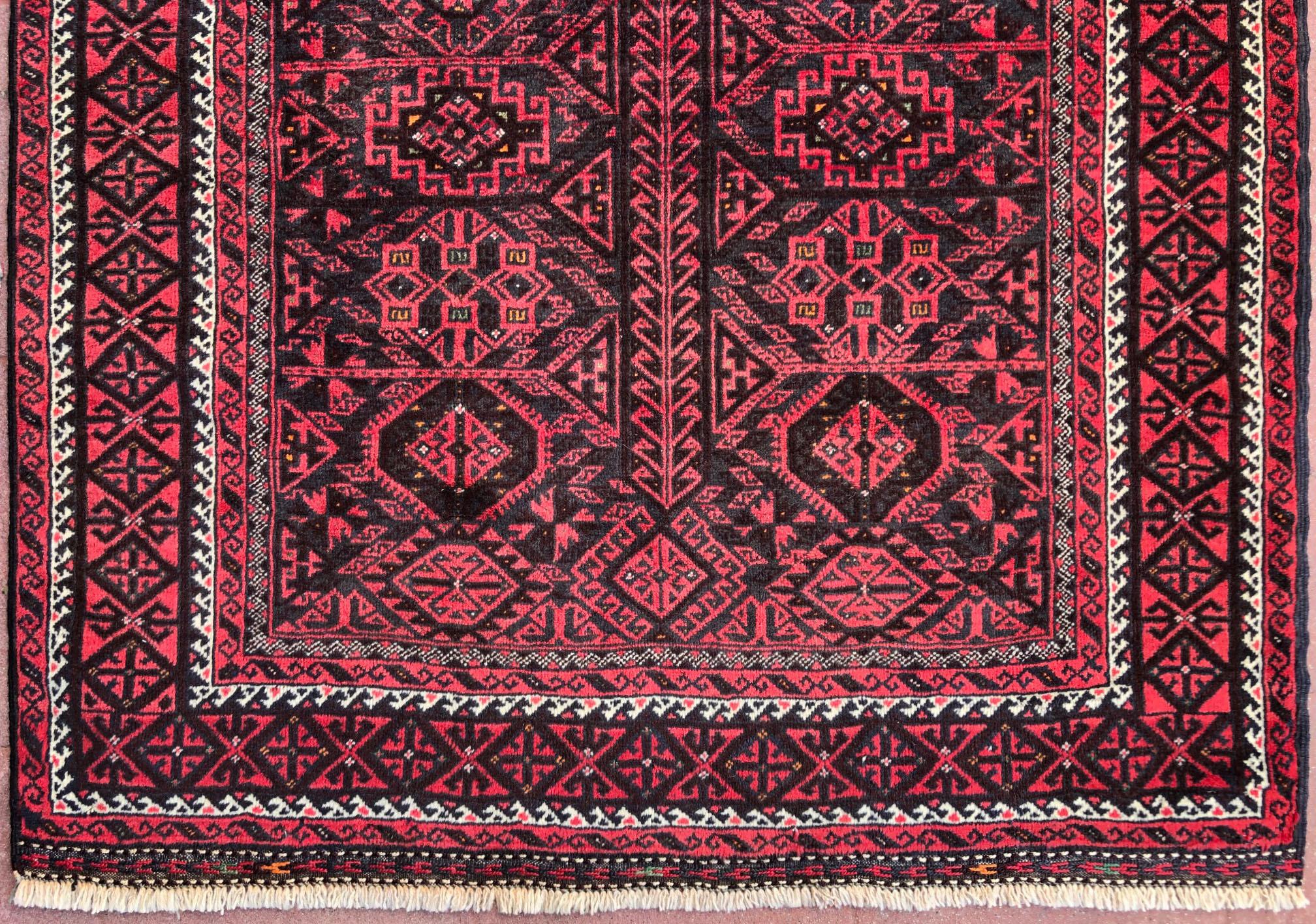 Authentic Persian Hand Knotted Geometric All-Over Red Black Baluchi Rug, 1960 For Sale 2