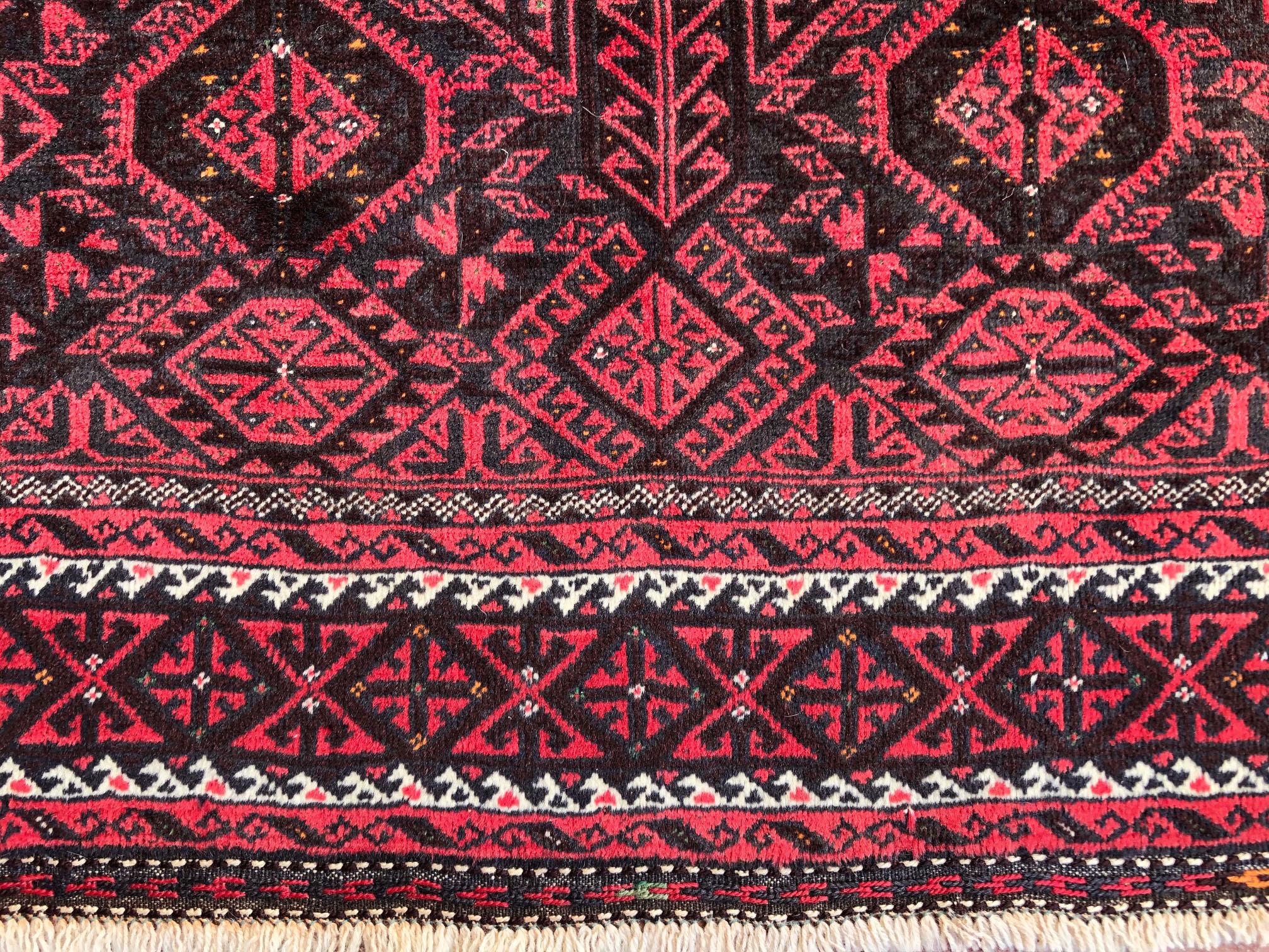 Wool Authentic Persian Hand Knotted Geometric All-Over Red Black Baluchi Rug, 1960 For Sale