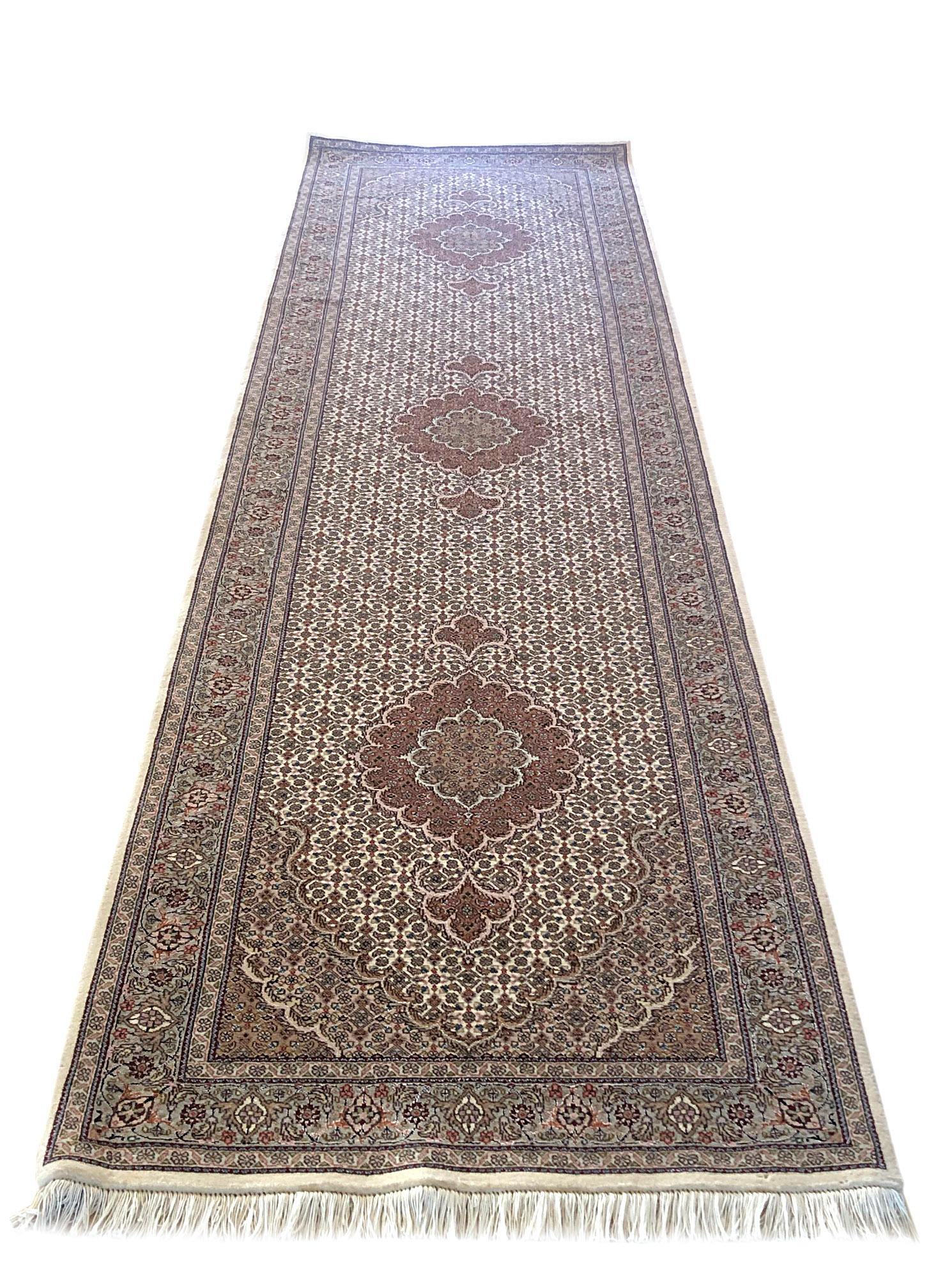 Tabriz rugs are well known for their excellent weaving and design. One of the very famous patterns of Tabriz rugs are Fish Design known as Mahi and is one of the classis patterns produced by the masterful carpet in Tabriz. This beautiful piece has