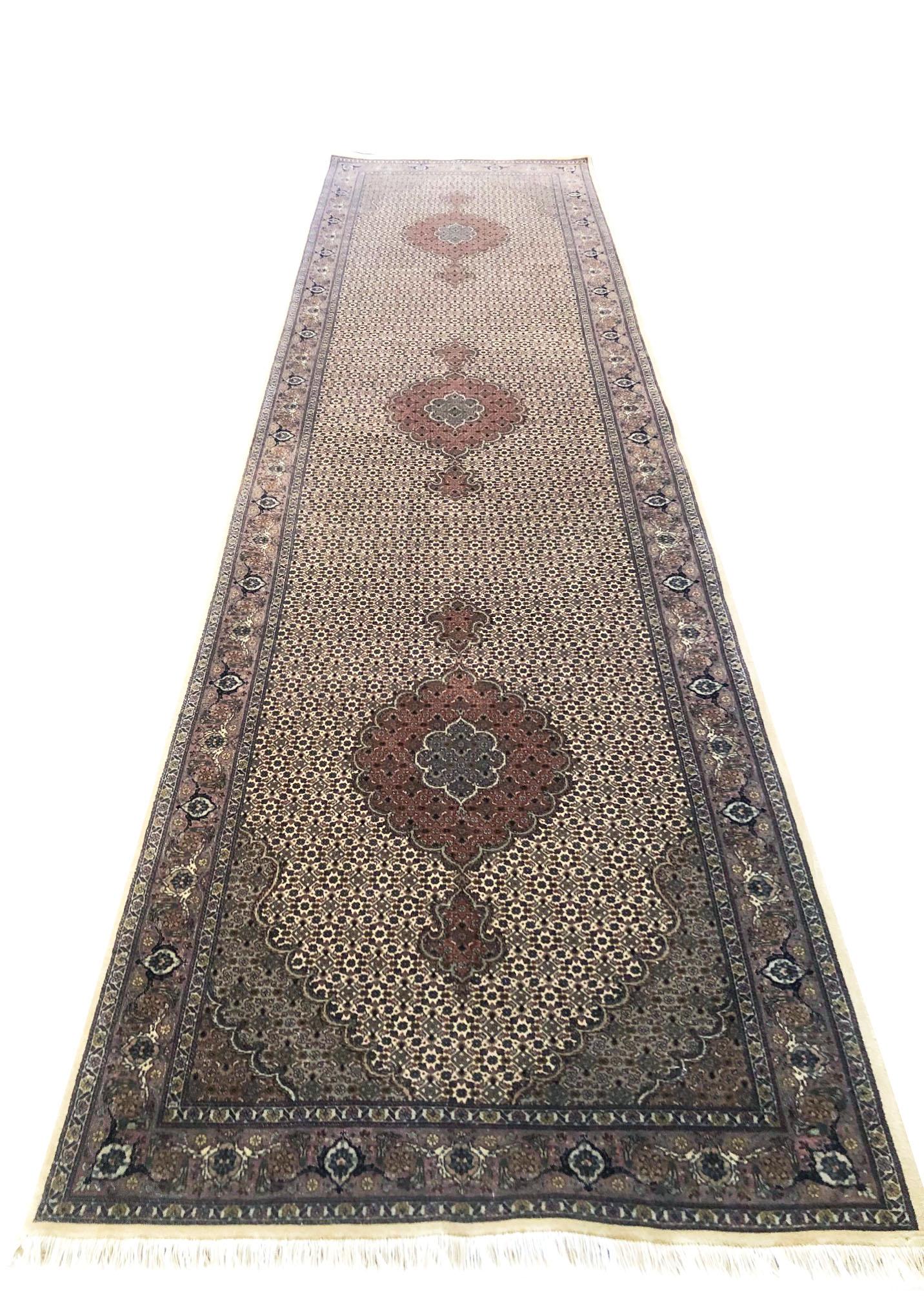 Tabriz rugs are well known for their excellent weaving and design. One of the very famous patterns of Tabriz rugs are Fish Design known as Mahi (repeated medallion) which is one of the classis patterns produced by the masterful carpet in Tabriz.
