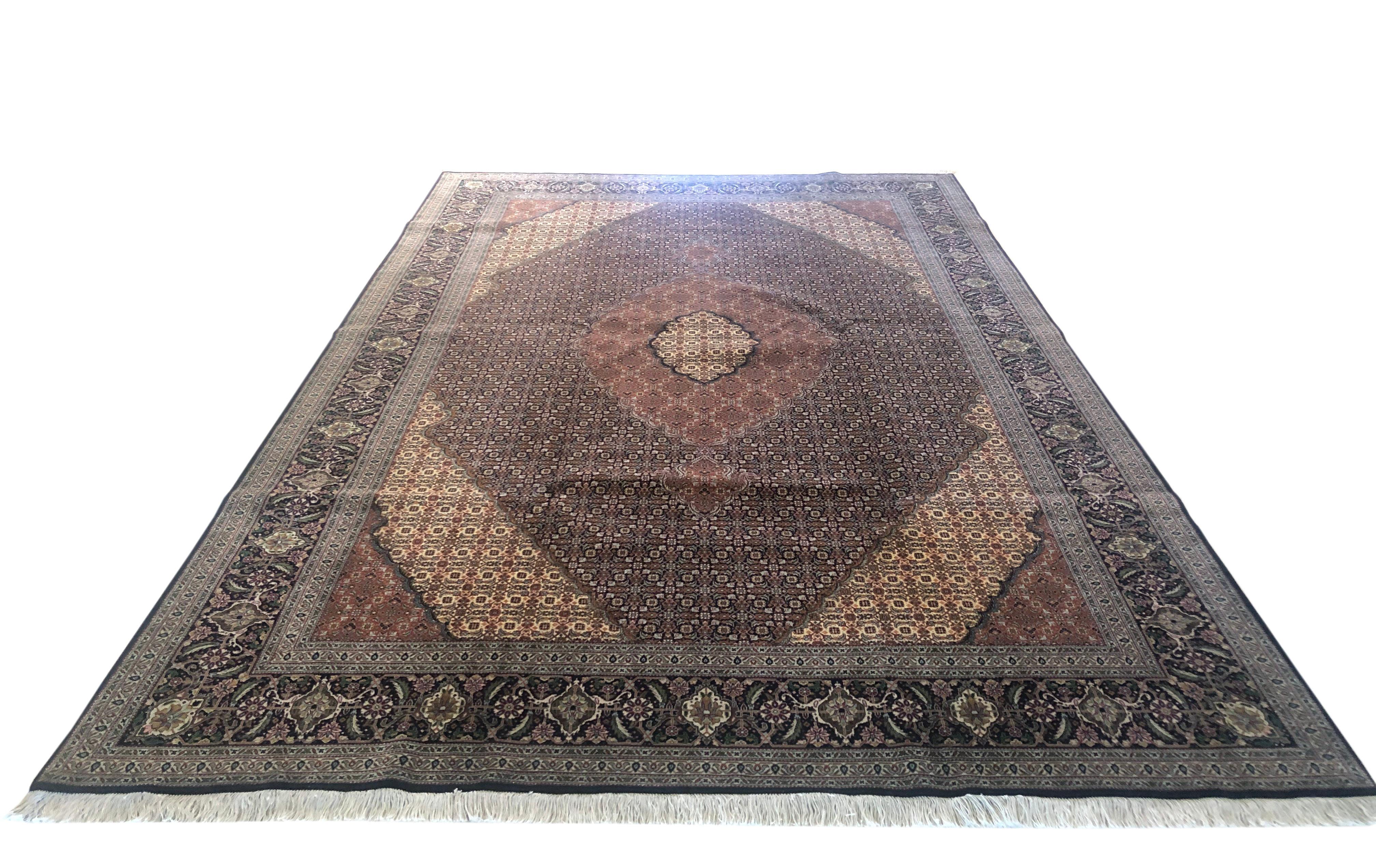 Tabriz rugs are well known for their excellent weaving and design. One of the very famous patterns of Tabriz rugs are Fish Design known is Mahi. This beautiful piece has wool and silk pile with cotton foundation. This is an 1970s 50 “RAJ” consistent