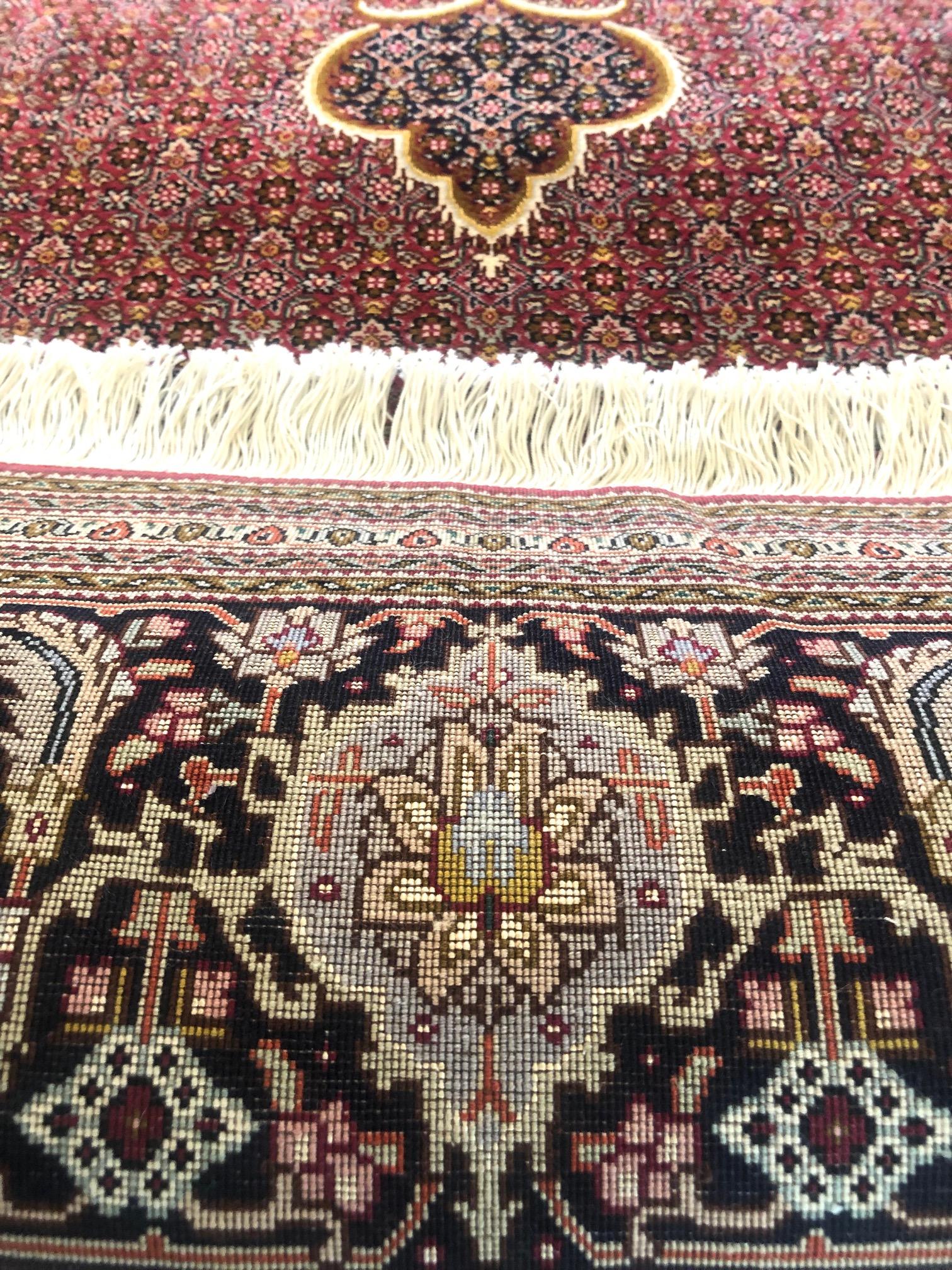 tabriz fish design rug