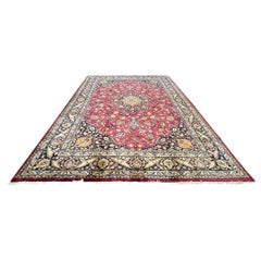 Authentique tapis persan Mashad rouge à médaillons floraux noués à la main, vers 1960