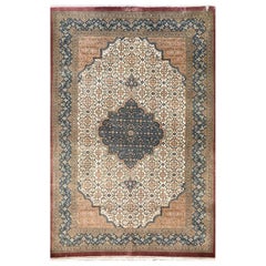 Authentique tapis persan noué à la main, médaillon floral en soie