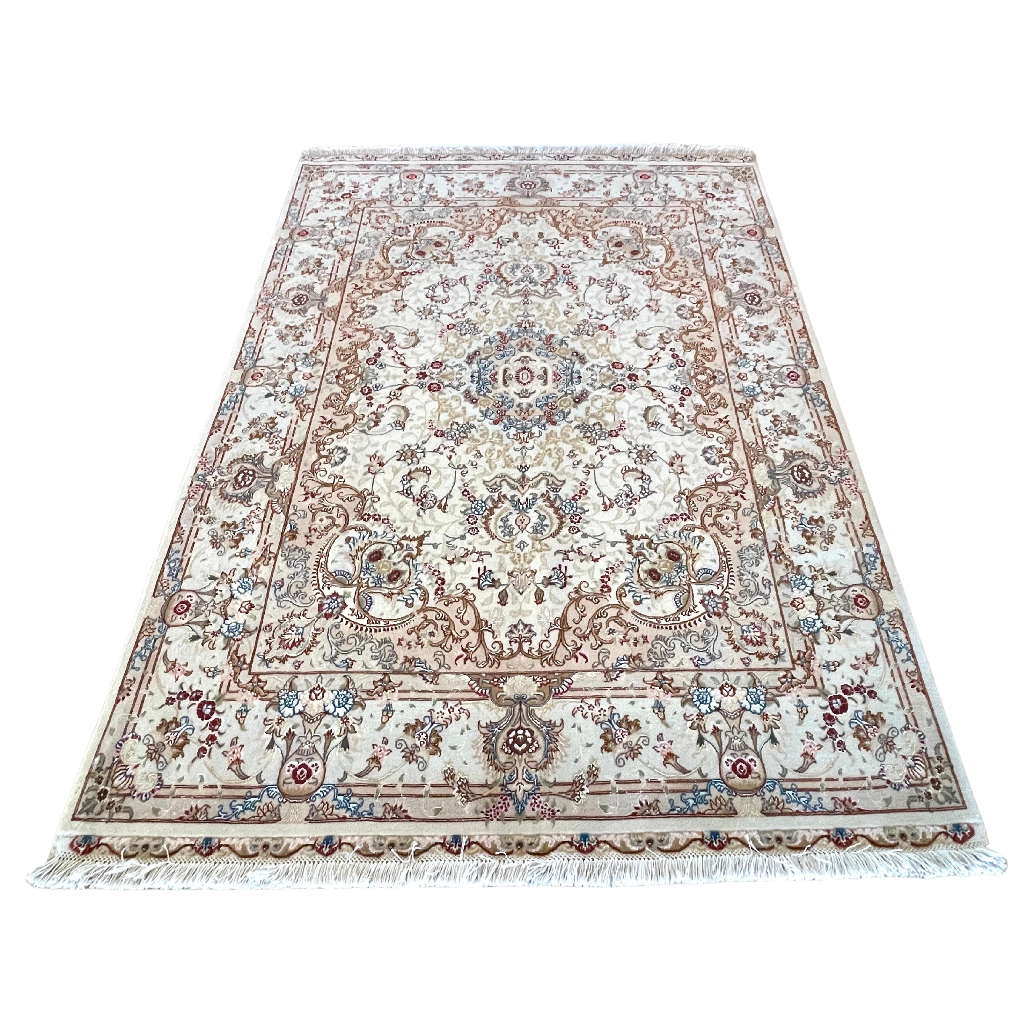 Introducing a stunning hand knotted Persian Tabriz rug that epitomizes quality craftsmanship and timeless beauty. Featuring an enchanting medallion floral design with an stunning kilim baft at both ends, this rug captivates with its unique blend of