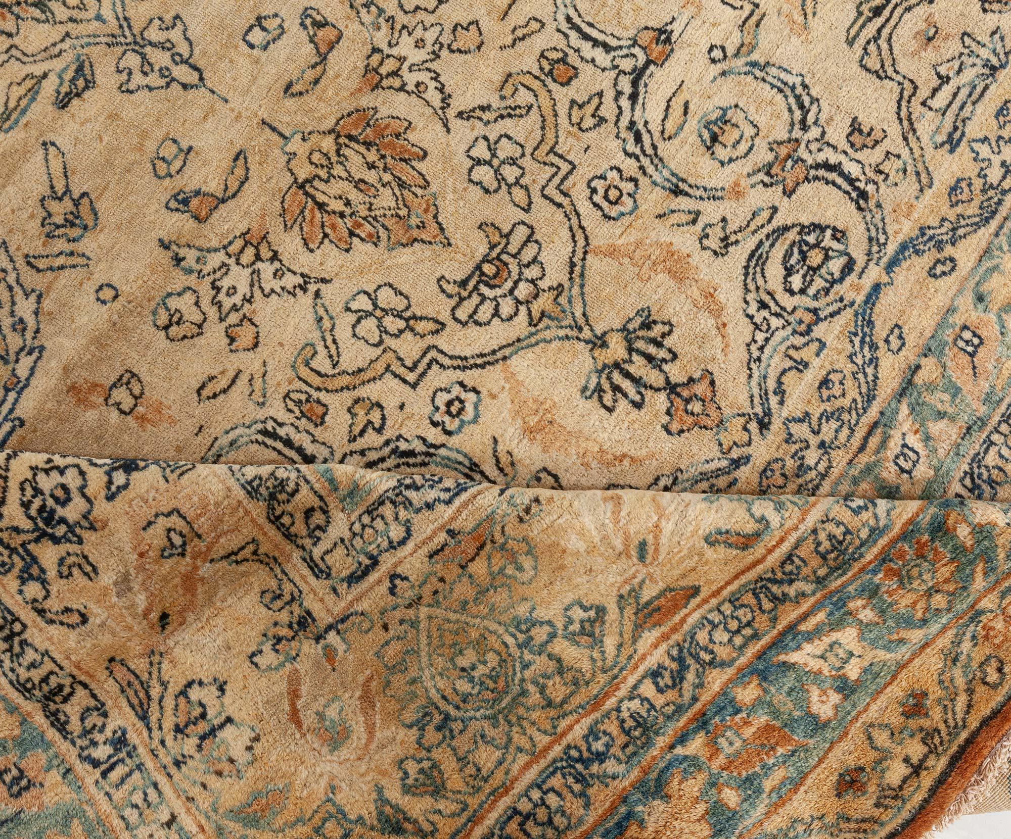 Authentic Persian Kirman handwoven wool rug
Size: 9'9