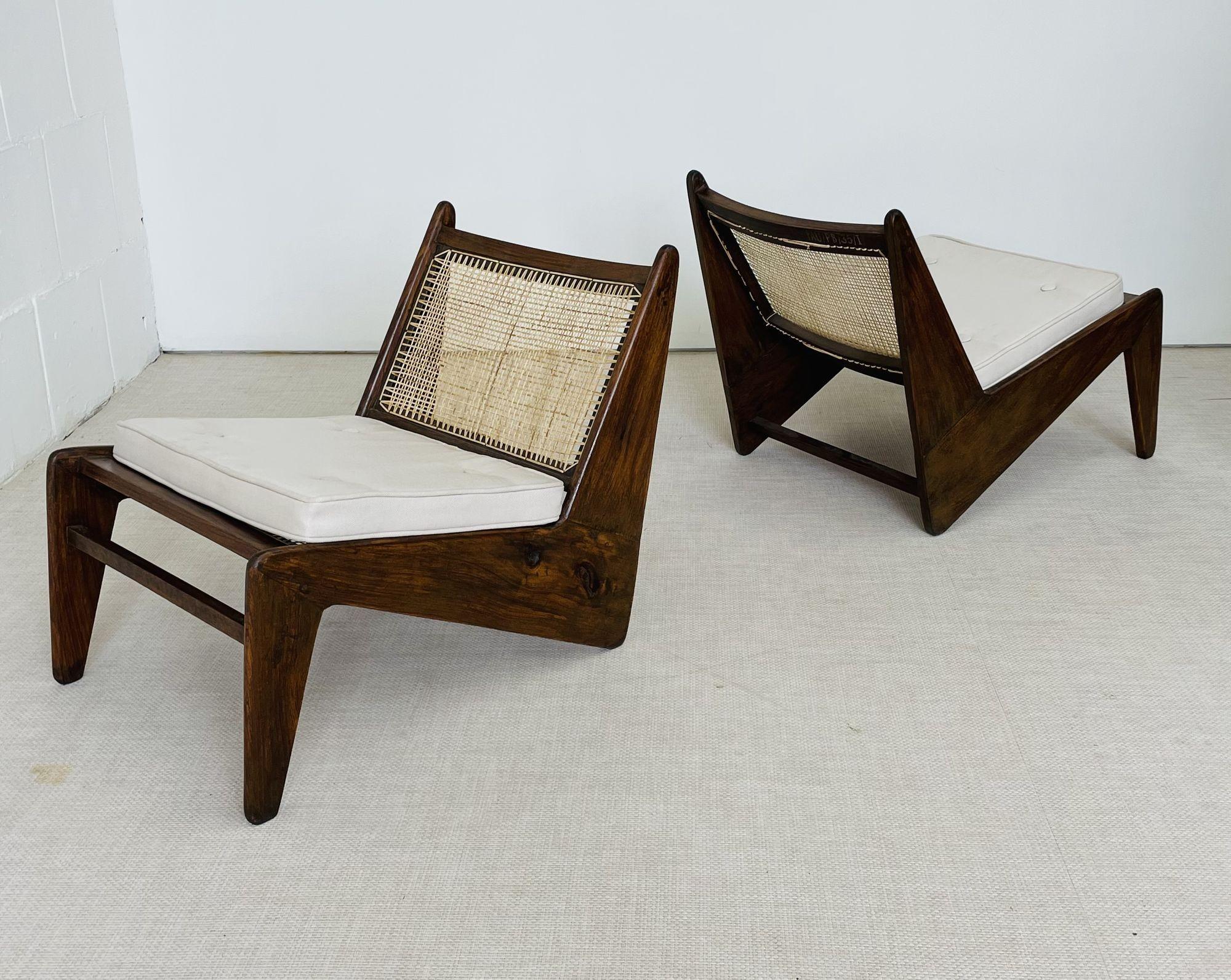 Pierre Jeanneret, French Mid-Century, Kangaroo Chairs, Teak, Cane, India, 1960s

Pierre Jeanneret 'Kangourou' chairs, Model PJ-SI-59-A. Chic and stylish lounge or slipper chair by Pierre Jeanneret. This unique pair of chairs features a caned seat