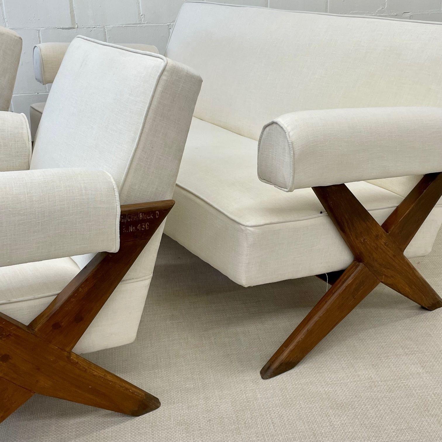 Pierre Jeanneret, French Mid-Century Modern, Upholstered Sofa Set, X-Leg, White Linen, India, 1960s
 
Rare sofa set comprised of slightly tilted backrest, seat, and armrests sitting on a double x-leg assembly base.
  
France, India, c. 1960s
 
Each
