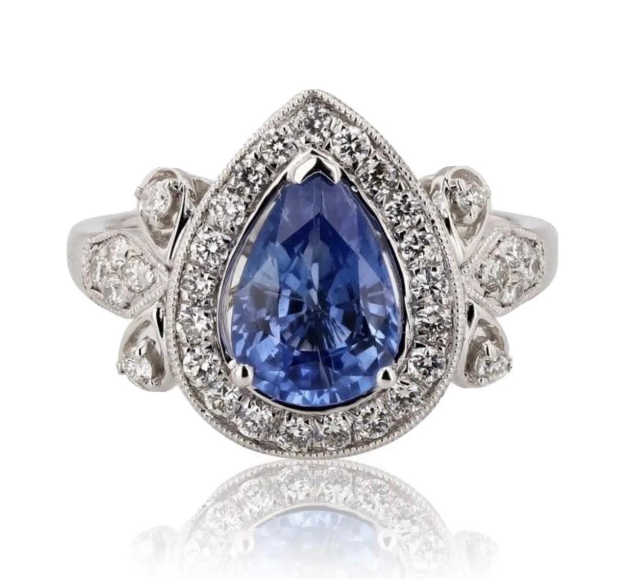 Genuine solid platinum 2.02ct. sapphire & .45ct. diamond ring in brand new condition, appraised at $12,295 (appraisal included). This is gorgeous engagement ring or statement piece! Size 7, weighs 6.80g - this ring is resizable.

Additional