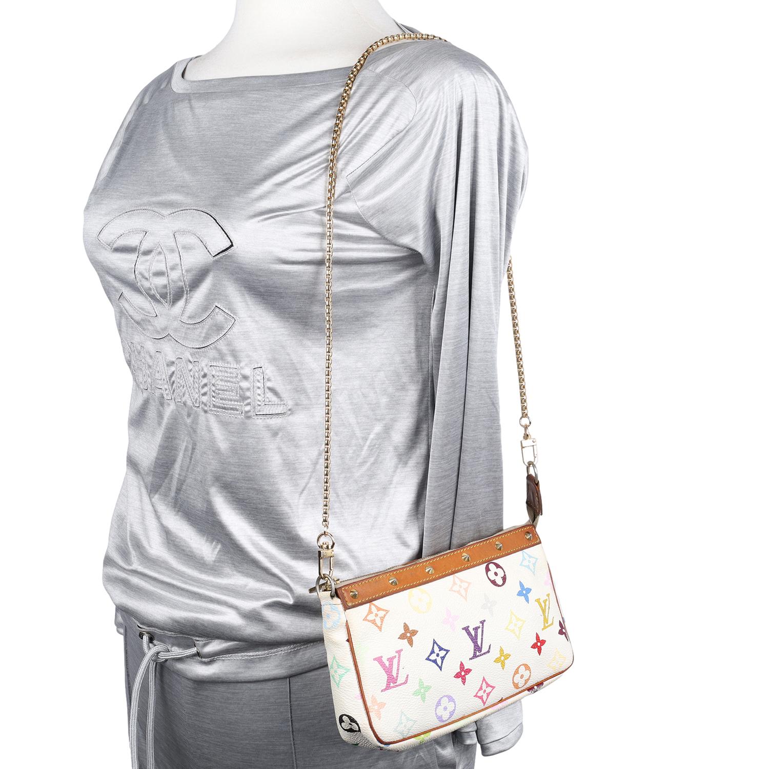 Authentic, pre loved Louis Vuitton Takashi Murakami monogram multicolor pochette cross body bag. Features 33 vibrant colors on white coated canvas with gold studs, zipper top closure with burgundy microfiber interior. Pochette with non-LV gold cross