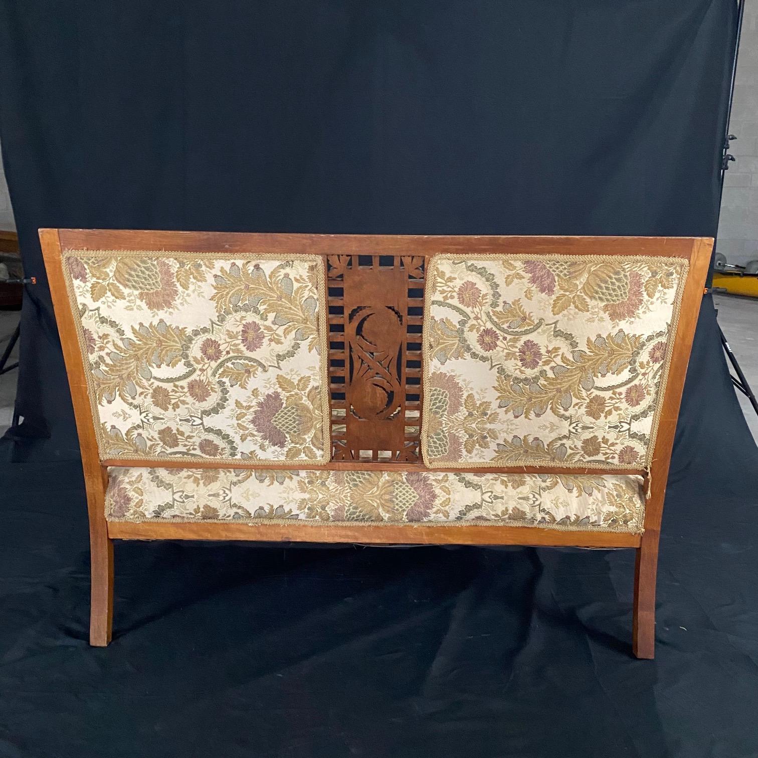 American Authentic Rare Eastlake Aesthetic Movement Ornate Carved Walnut Loveseat For Sale