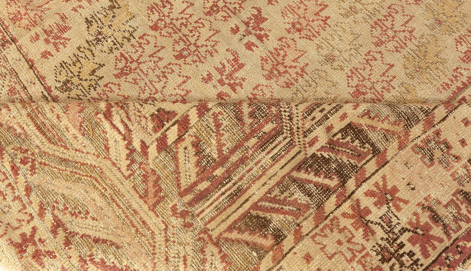 Authentic 19th Century Red Handmade Turkish Ghiordes rug
Size: 13'0