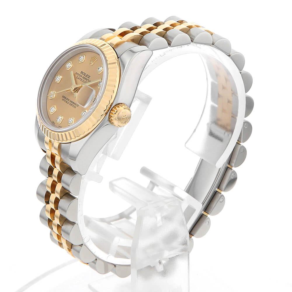 Embrace timeless elegance with the Rolex Datejust 179173G, a luxurious timepiece that perfectly embodies the fusion of classic design and exceptional craftsmanship. This exquisite ladies' watch features a stunning champagne dial, beautifully