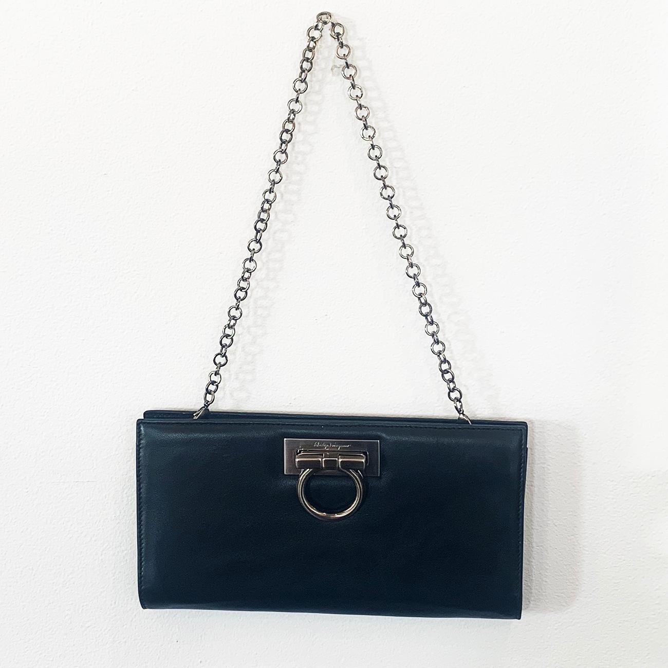 Authentic Salvatore Ferragamo Handbag or Clutch Purse  with removable, black chrome chain Handle, with Lobster Claw Clasp at end of chain handle (all made in Italy). New Old Stock with original  “signed” Dust bag included. All in excellent