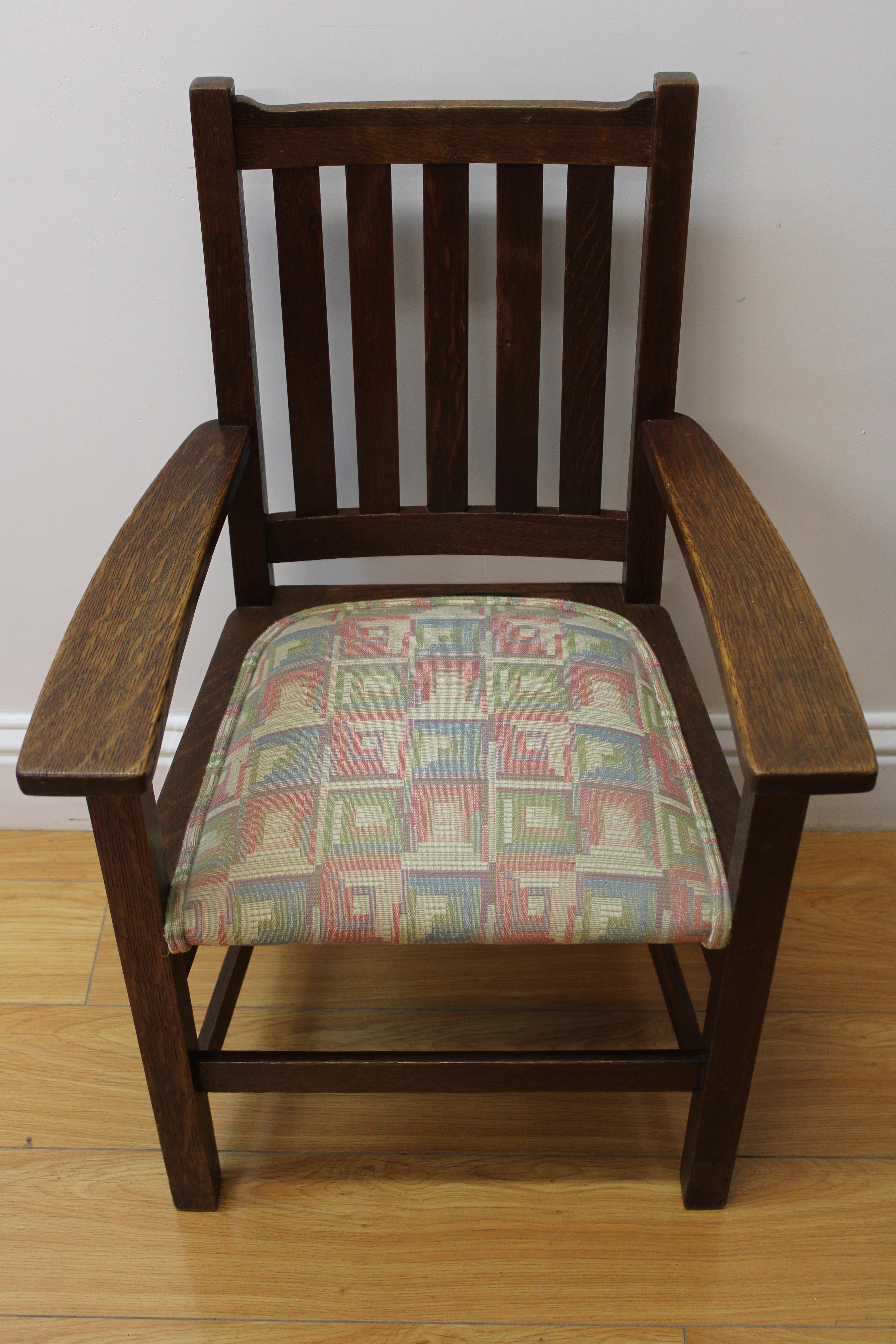 C. 20th Century.

Adorable authentic Stickley Brothers quaint child's chair, made from quartersawn oak & has fabric upholstered seat.