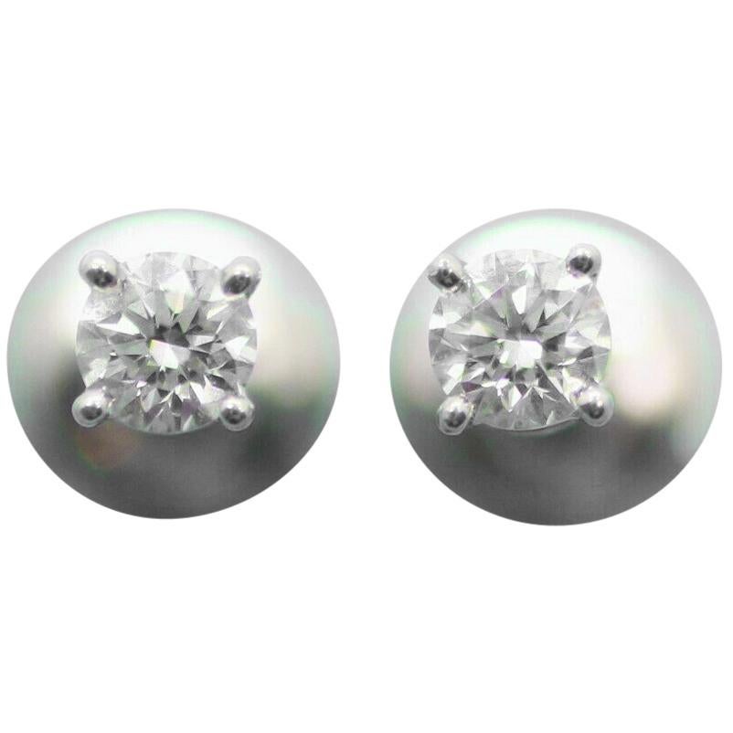 Authentic Stud Earrings of Round Brilliant Diamonds in Platinum .50pts