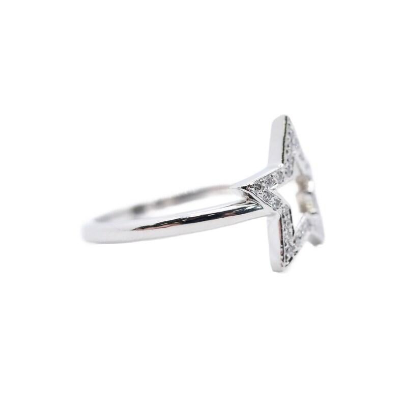 Women's Authentic Tiffany & Co 0.15ctw Diamond Star Ring in Platinum Vintage For Sale