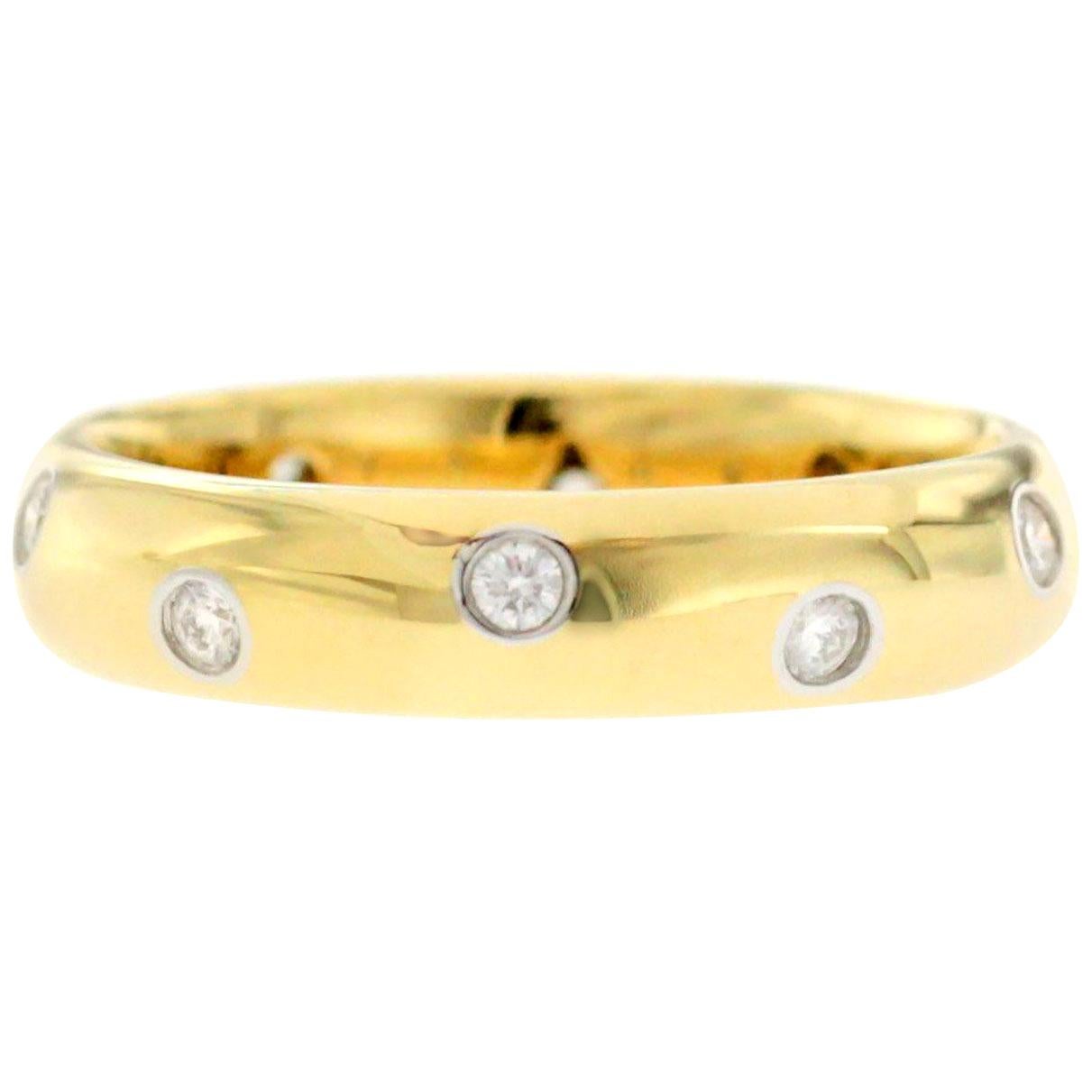 Authentic Tiffany 
Co. 18 Karat Yellow Gold Platinum Diamonds Etoile Band Ring