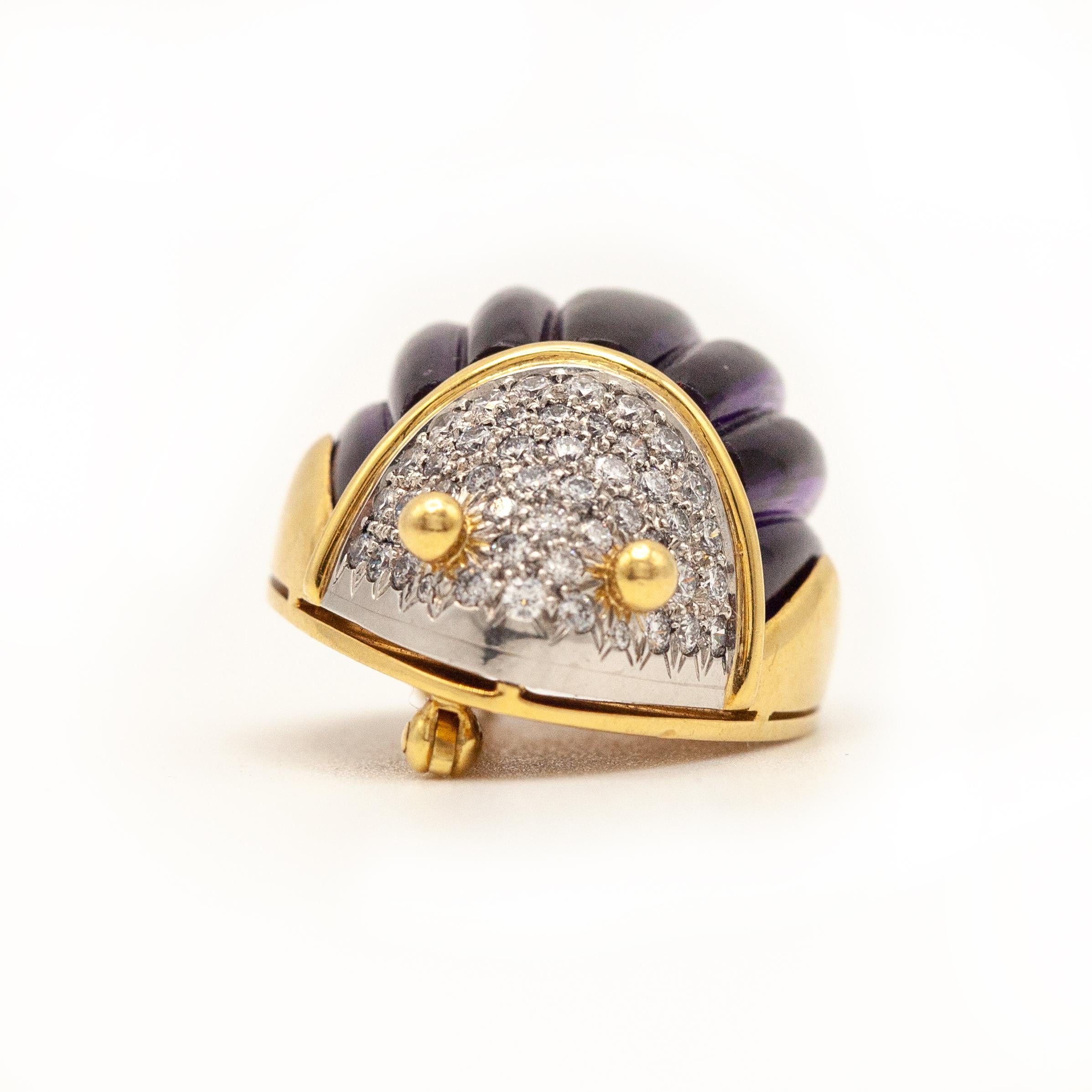 Authentic TIFFANY & CO 18K yellow gold diamond amethyst Scarab Brooch. The scarab has a carved amethyst body, the head has 44 diamonds set on platinum.

Approximate Overall Measurement:
1.11” x 0.84” x 0.55”

Approximate Gross Weight: 19.90