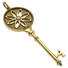 Authentic Tiffany & Co. 18K Yellow Gold Diamond Daisy Flower Key Pendant