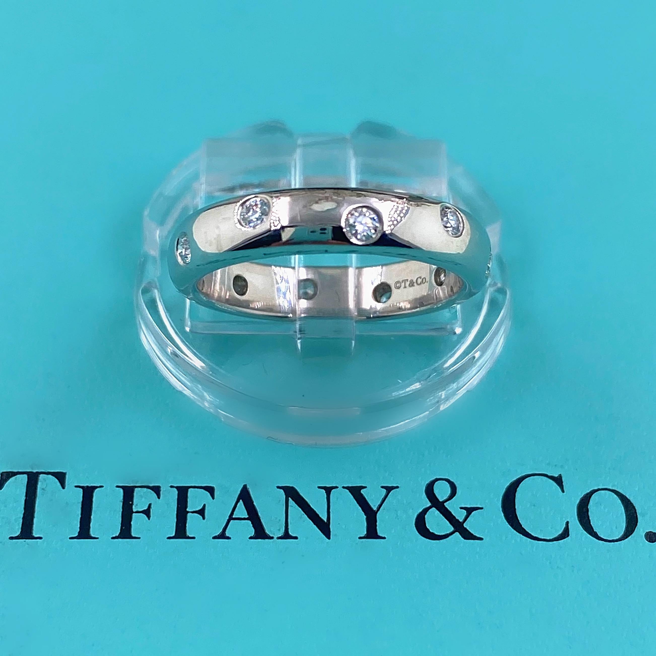 Tiffany & Co. ETOILE Diamond Band 
Style:  Diamond Wedding Band
Metal:  PT950 Platinum
Size:  5.75 
Width:  4 MM 
TCW:  0.22 tcw
Main Diamond:  Round Brilliant Diamonds
Color & Clarity:  E - F, VS
Hallmark:  ©T&CO. PT950
Includes:  T&C Ring