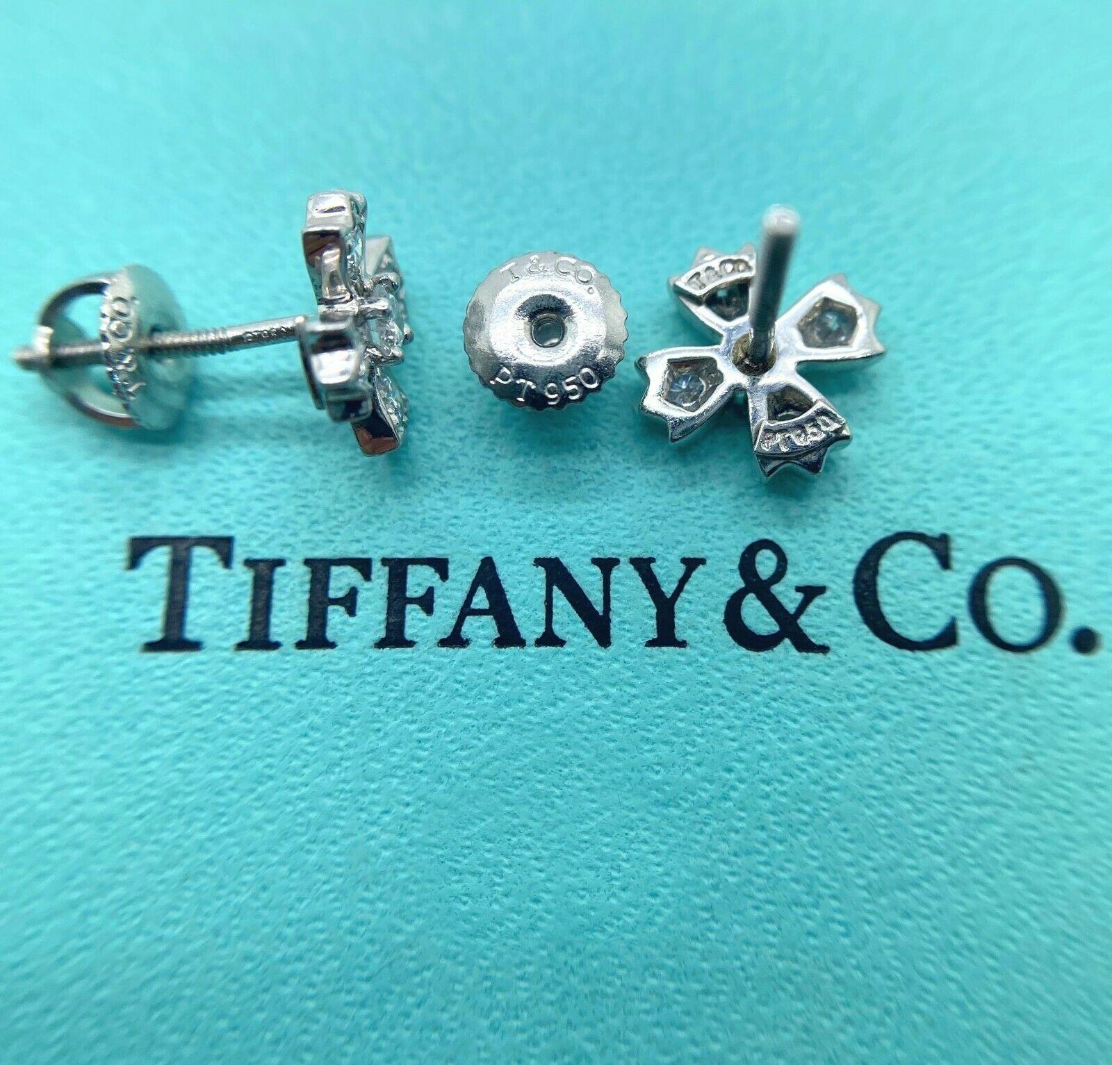 Authentic Tiffany & Co. floret stud earrings of round brilliant diamonds in platinum. Round brilliant diamonds, carat total weight .70, color grade G, clarity grade VVS2.
Specifications:
    main stone:DIAMONDS
    diamonds:10 PCS
    carat total