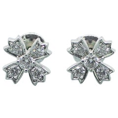 Authentic Tiffany & Co. Floret Stud Earrings of Round Brilliant Diamonds