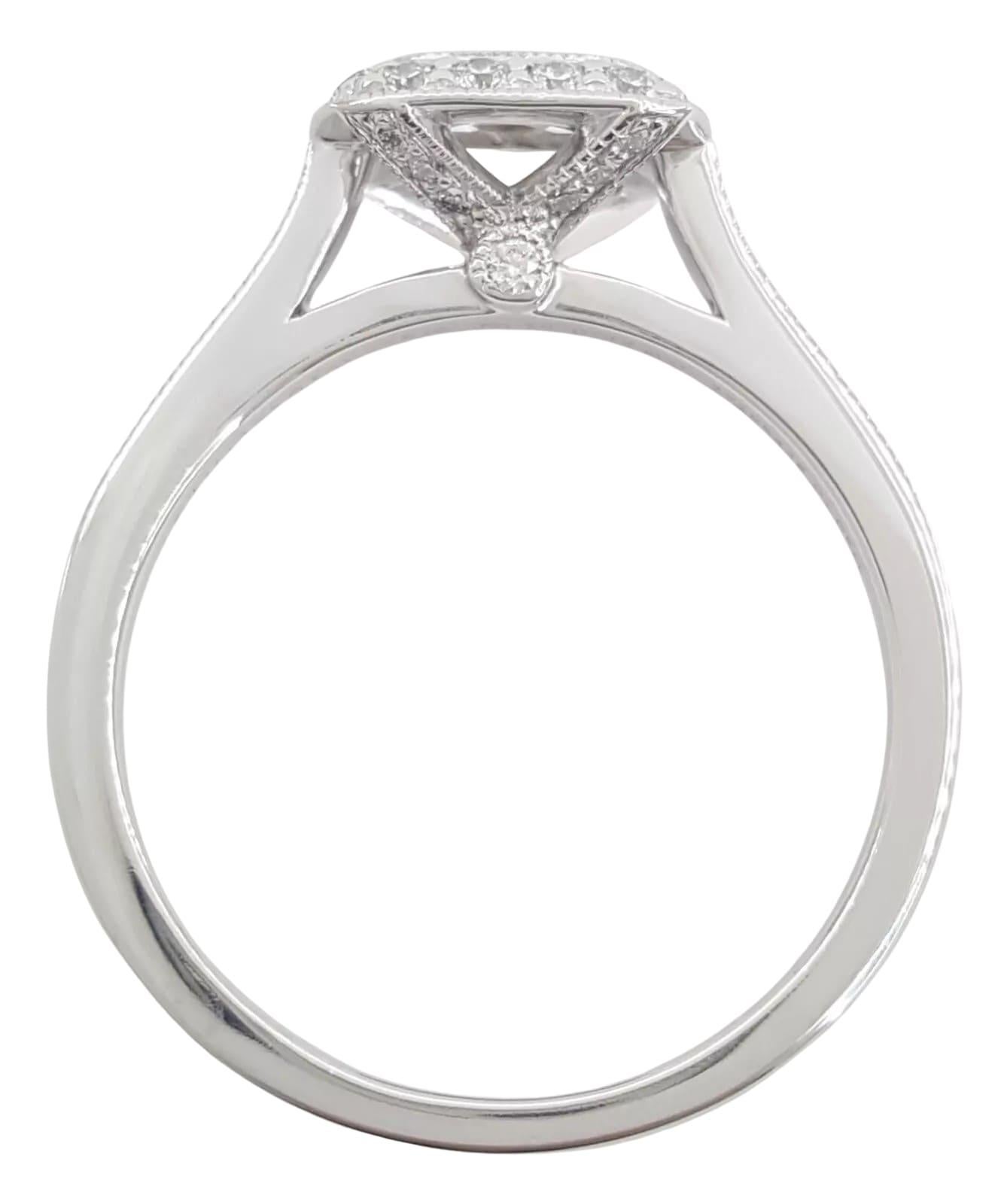 Tiffany & Co. Platinum Legacy Engagement Ring you described features a stunning 1.05 ct Legacy Cushion Brilliant Cut Diamond at its center, which has a F color grade and VS1 clarity. This diamond is cut with Excellent quality, a Very Good polish,