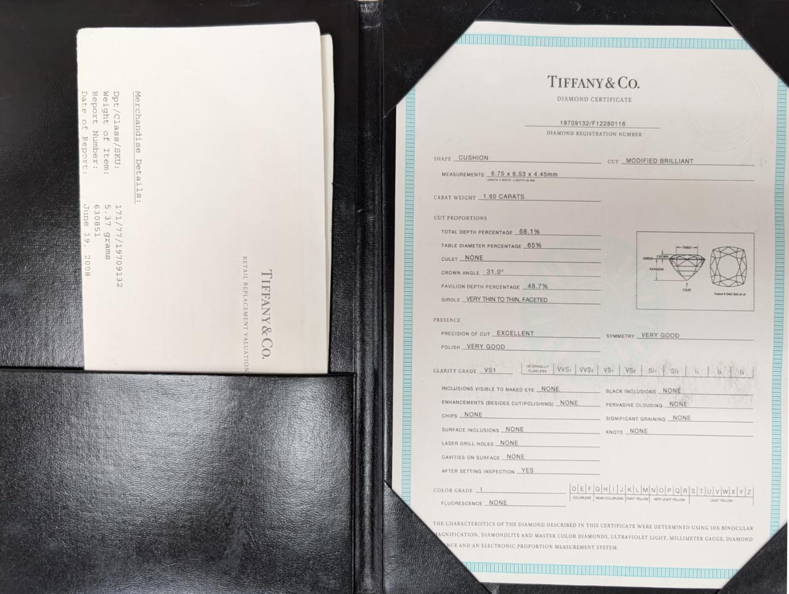This timeless Tiffany & Co. creation is crafted in platinum and features the iconic Legacy Cushion Brilliant Cut Diamond as the centerpiece, weighing 1.60 carats, graded I color, VS1 clarity, with an Excellent Cut, Very Good Polish, and Very Good