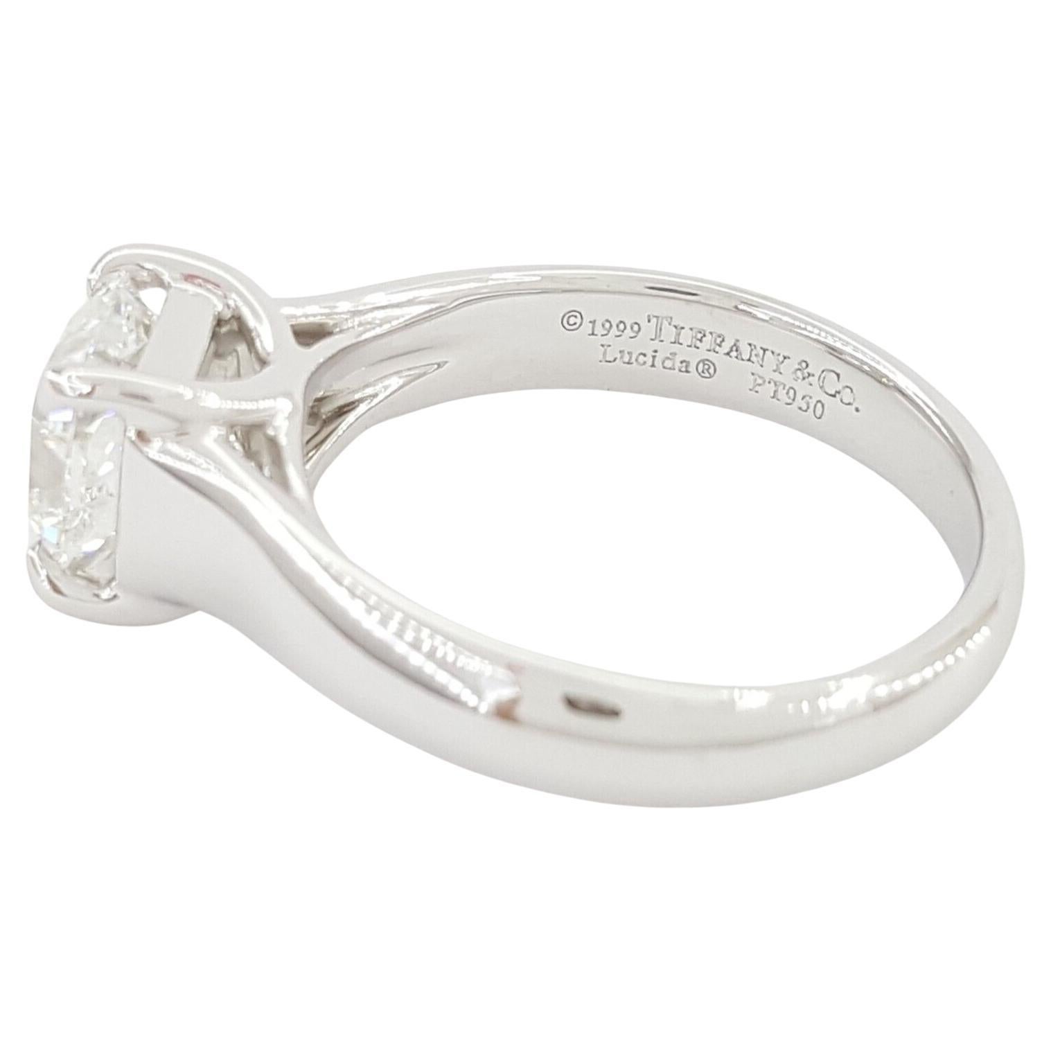 Authentic Tiffany & Co. Platinum 1.19 ct Lucida Square Brilliant Cut Diamond Solitaire Engagement Ring.
The ring weighs 5.1 grams, size 3.75 (can be resized to a larger size), the center stone is a Natural 1.19 ct Lucida Square Brilliant Cut