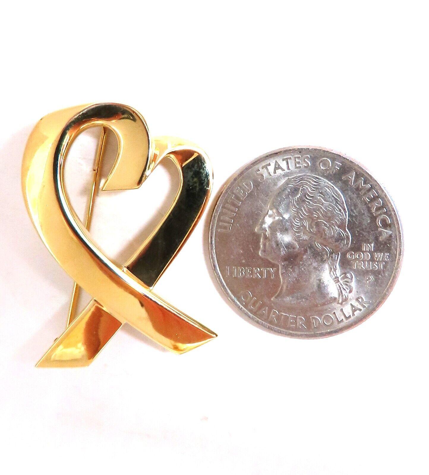 Designer Tiffany Heart Gold pin.

32 x 23mm

18kt. yellow gold 

9.6 grams