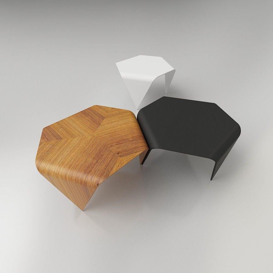 Authentic trienna table with oak veneer by Ilmari Tapiovaara & Artek. This incredibly distinctive table is formed from three sheets of pressed oak veneer. The hexagonal tabletop is supported by three triangular legs. The seams between the pieces