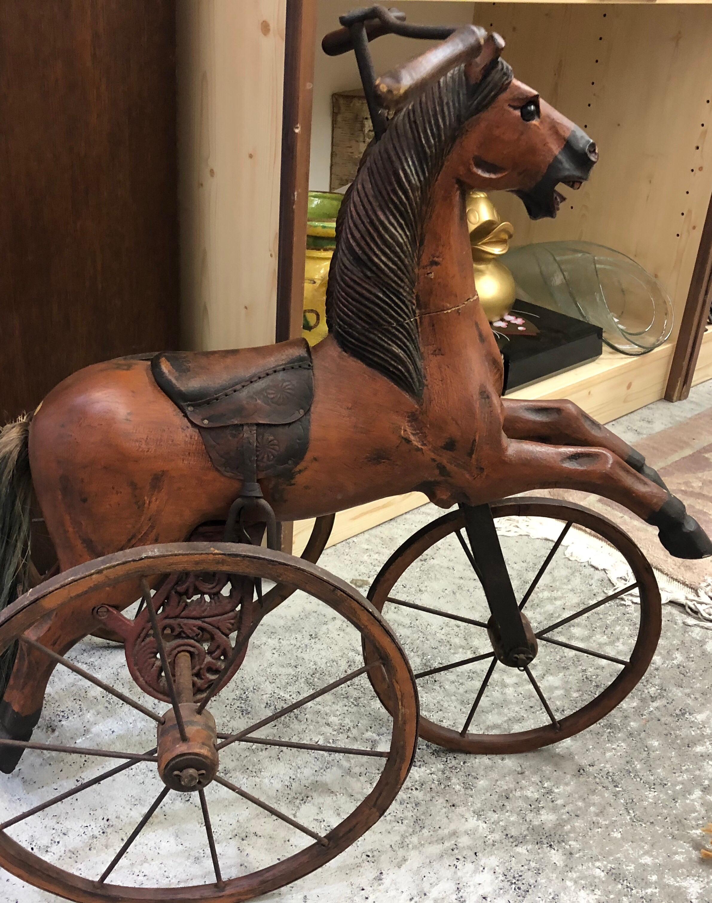 Authentic Tripod Children's wooden rocking horse 19th century.





 