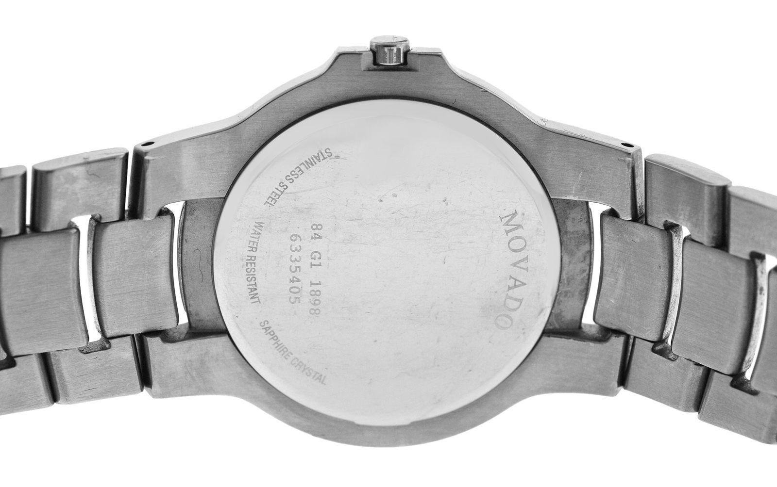 Brand	Movado
Model	Museum 84 G1 1898
Gender	Unisex
Condition	Pre-owned
Movement	Swiss Quartz
Case Material	Stainless Steel
Bracelet / Strap Material	
Stainless Steel

Clasp / Buckle Material	
Stainless Steel	
Clasp Type	Butterfly Deployment
Bracelet